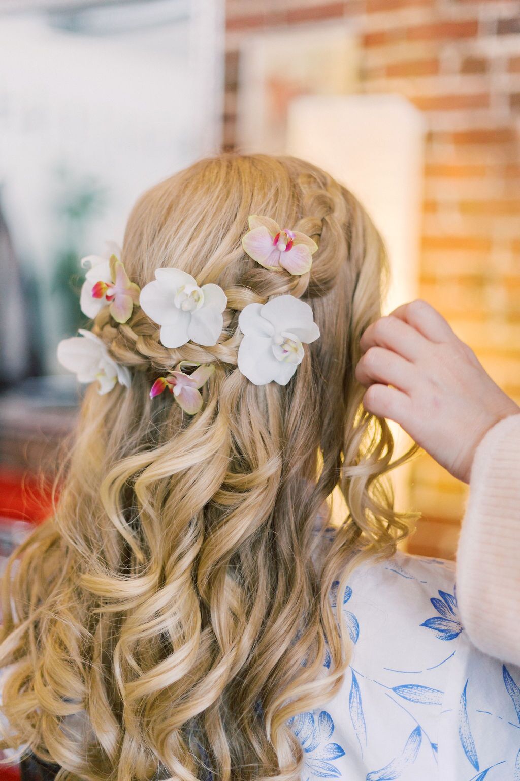 Half-Up Hairstyle with Orchids and Braids