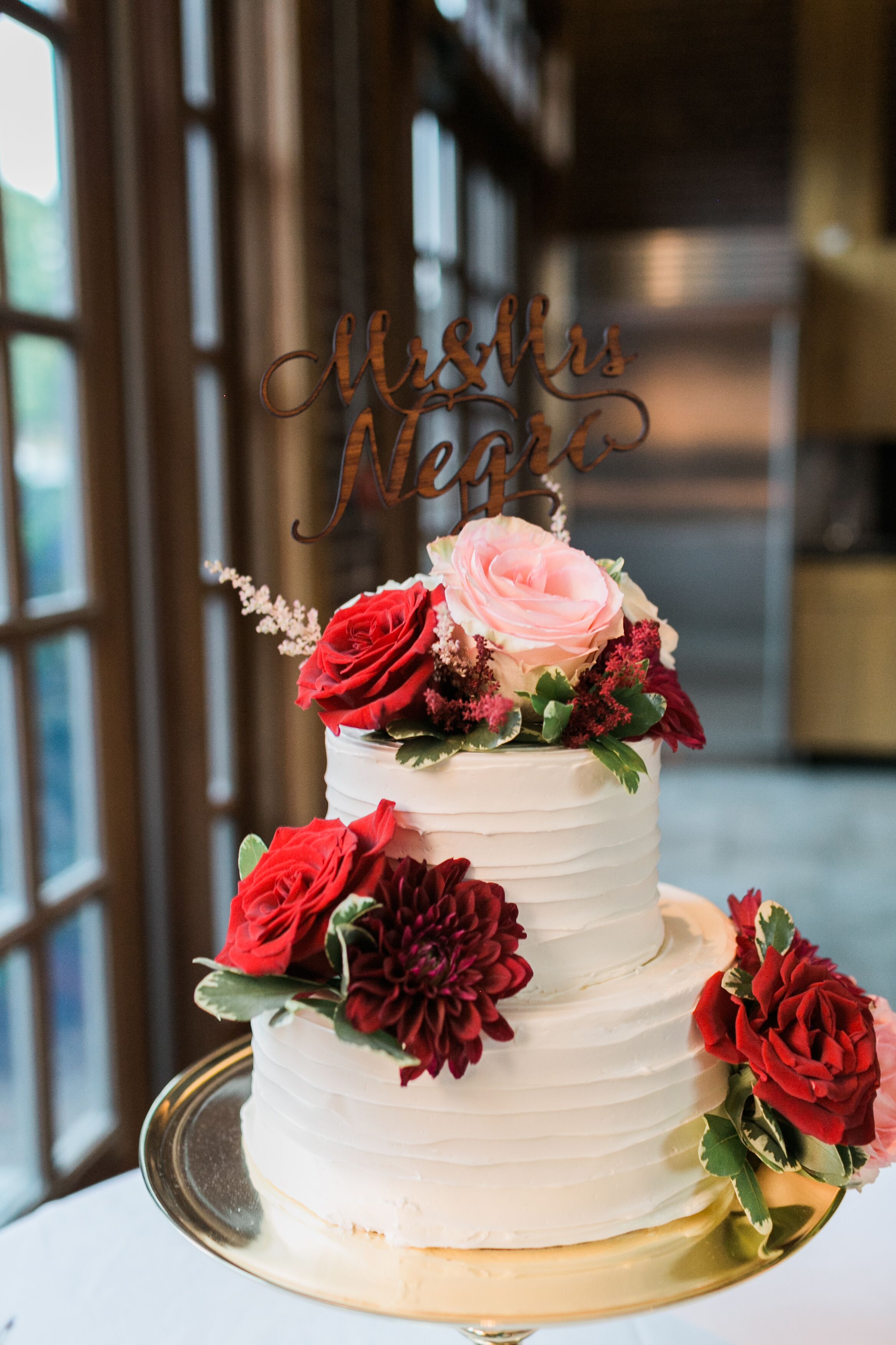 Two-Tier Buttercream Cake with Red Flowers