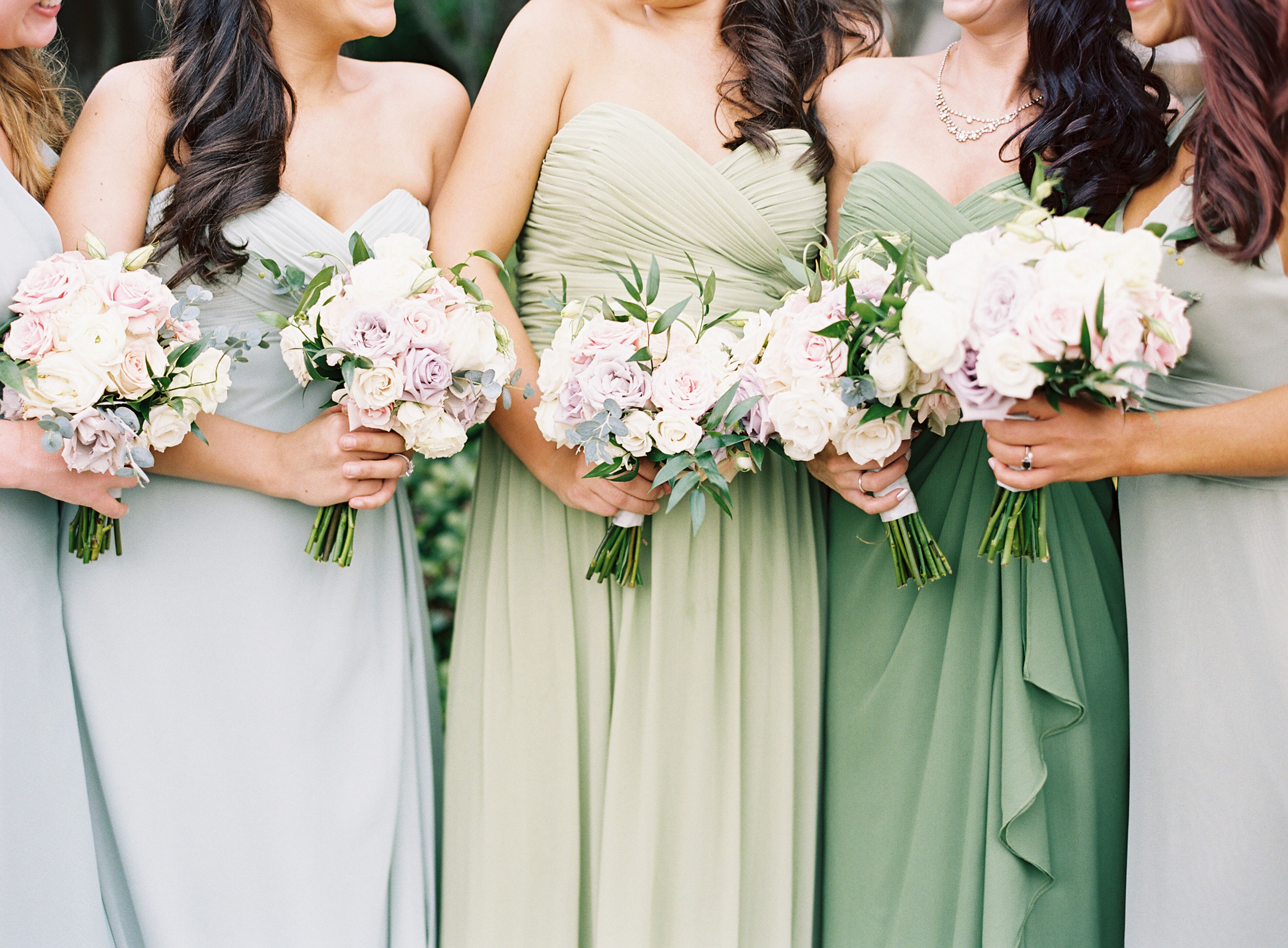 Green Bridesmaid Dresses and Rose Bouquets