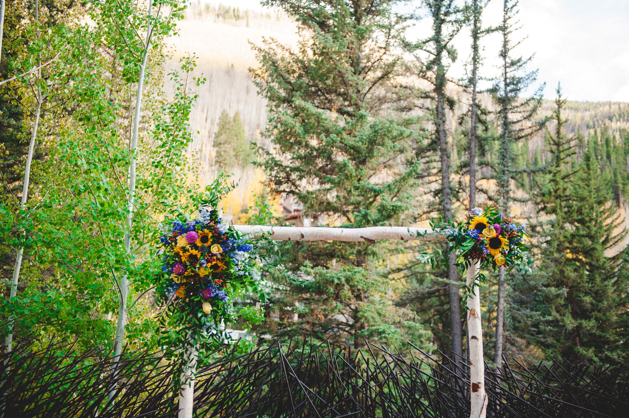 Aspen Wedding Arbor with Wildflower Decor