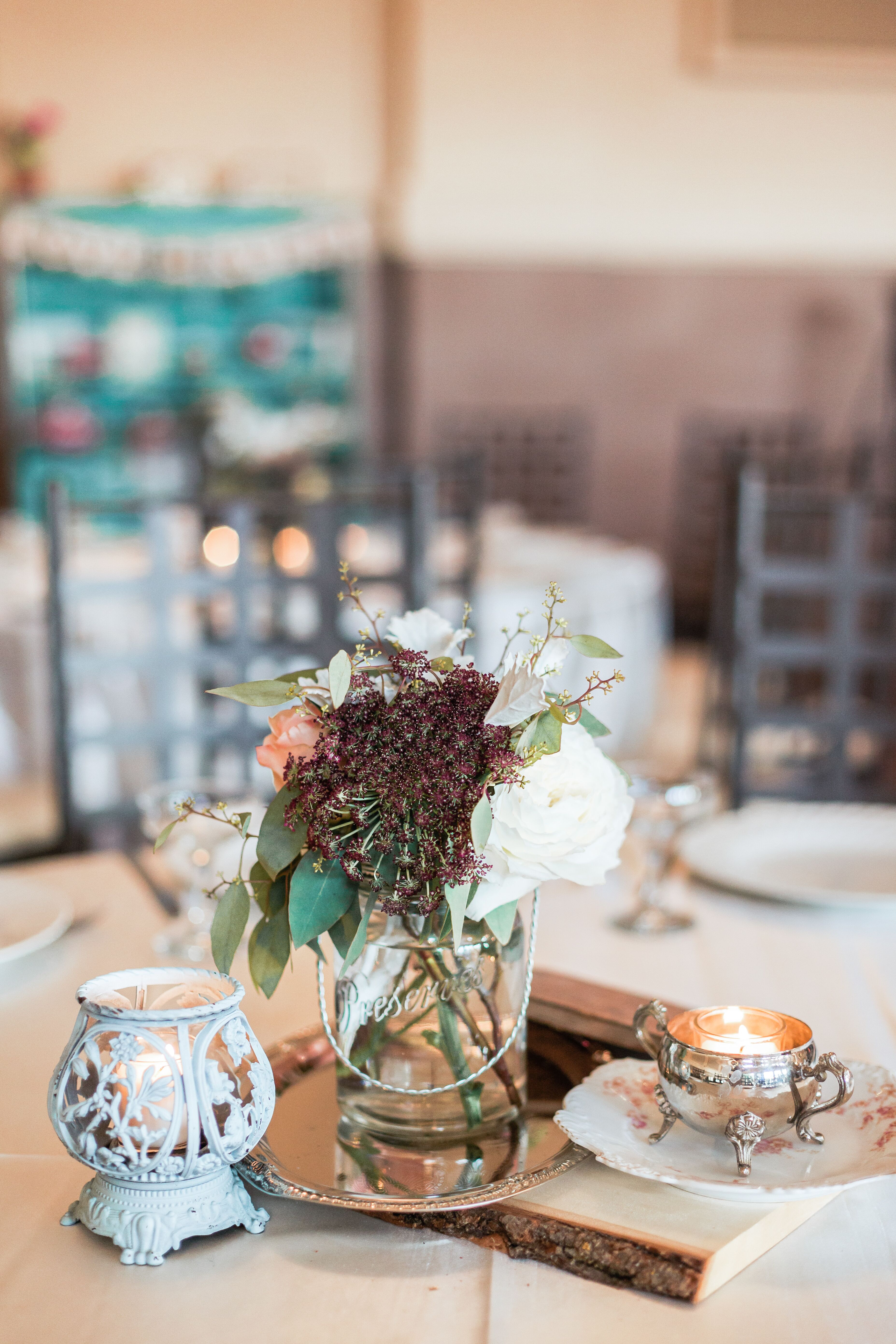 Mismatched Vintage Vase And Candle Centerpiece