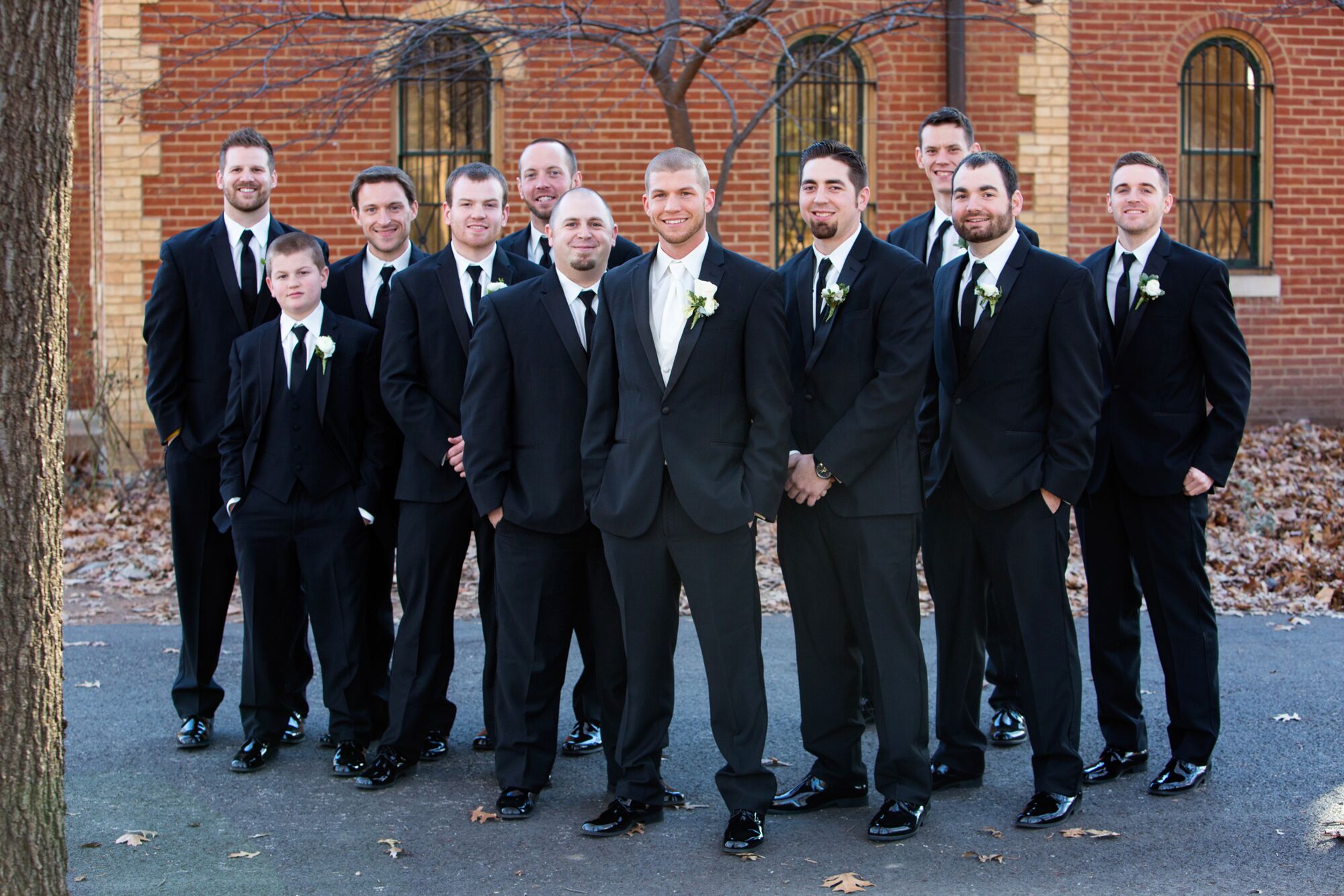 Groomsmen Dressed in Traditional Black Tuxedos