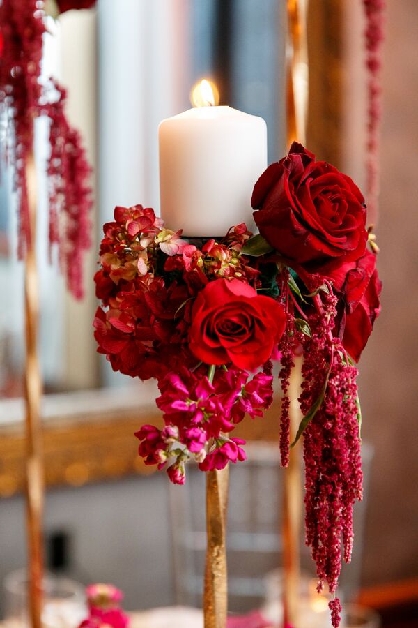 Elaborate Red Rose Centerpiece On Gold Stand