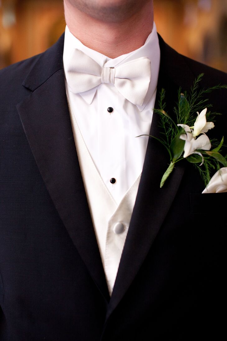 Groom in Black Tux with White Bow Tie