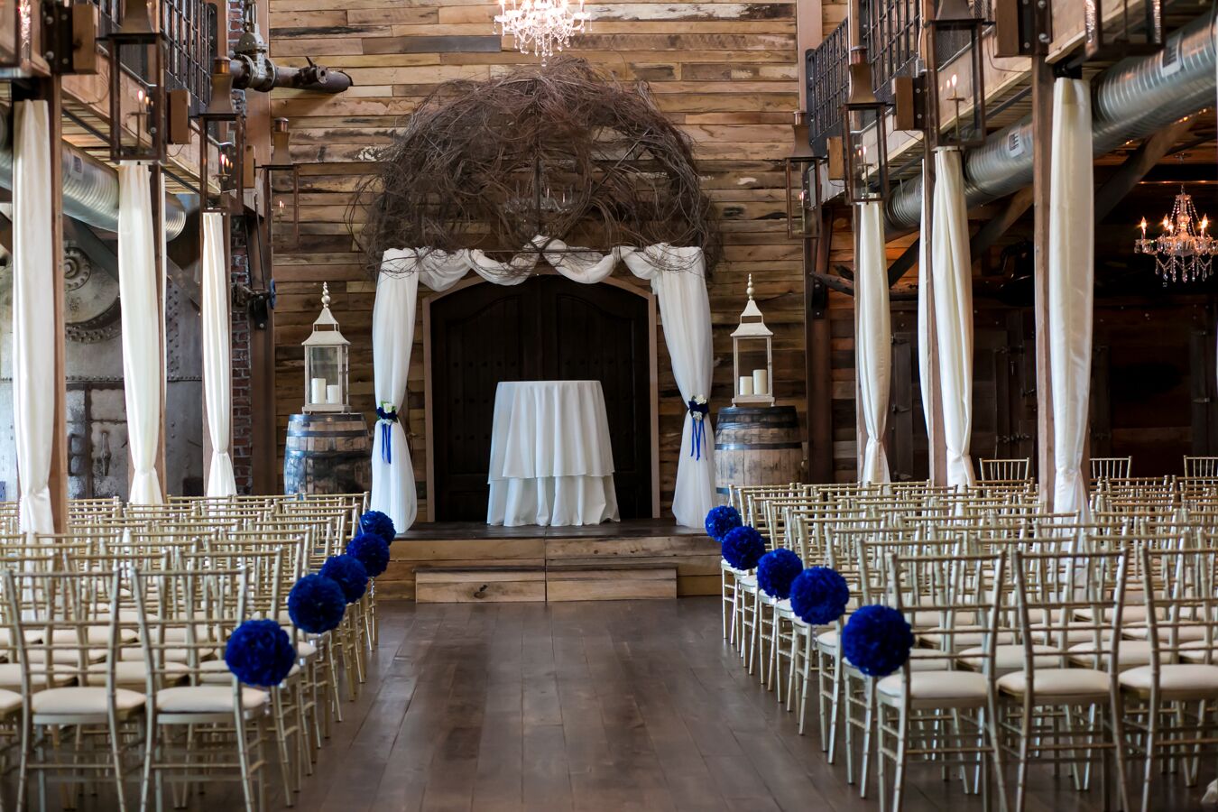 royal-blue-and-white-rustic-wedding-ceremony-at-southwind-hills