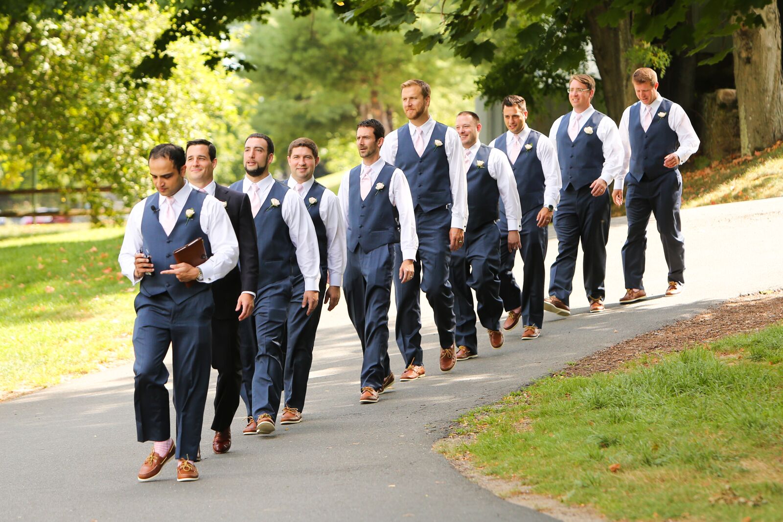 Groom in suit sale groomsmen in vests