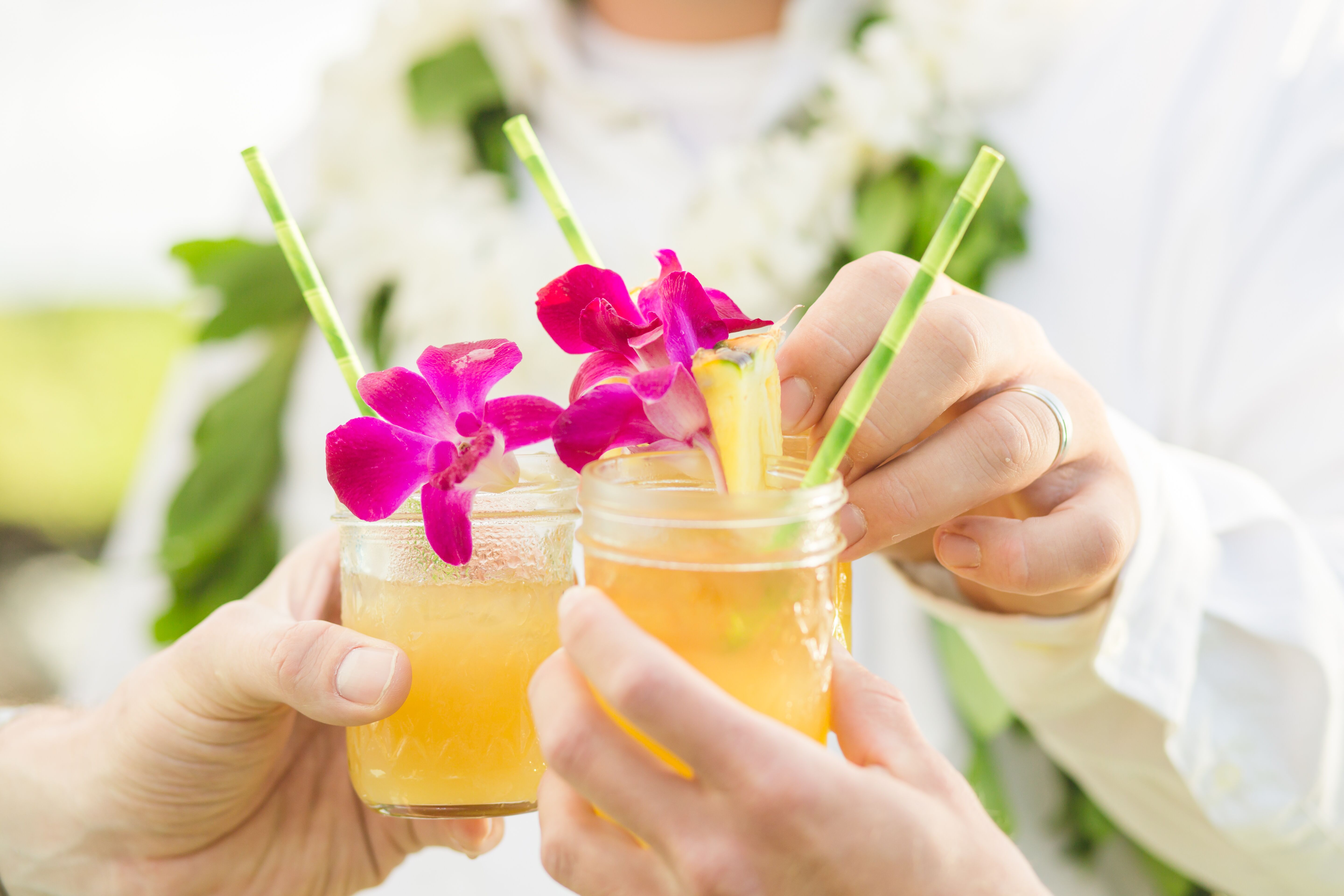 Cocktail with Fruit, Bamboo Straws and Orchids