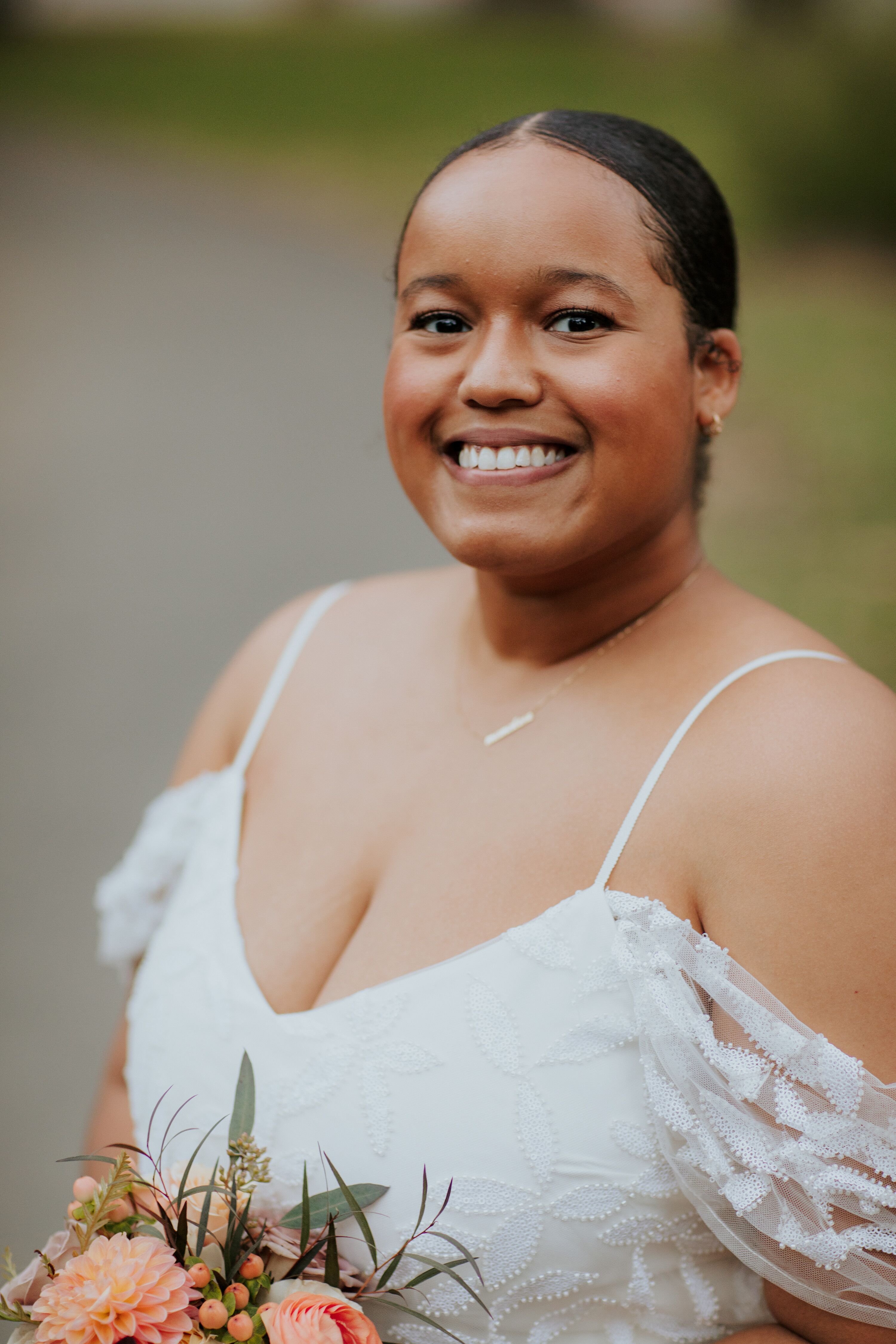 bride-with-off-the-shoulder-wedding-dress-and-updo