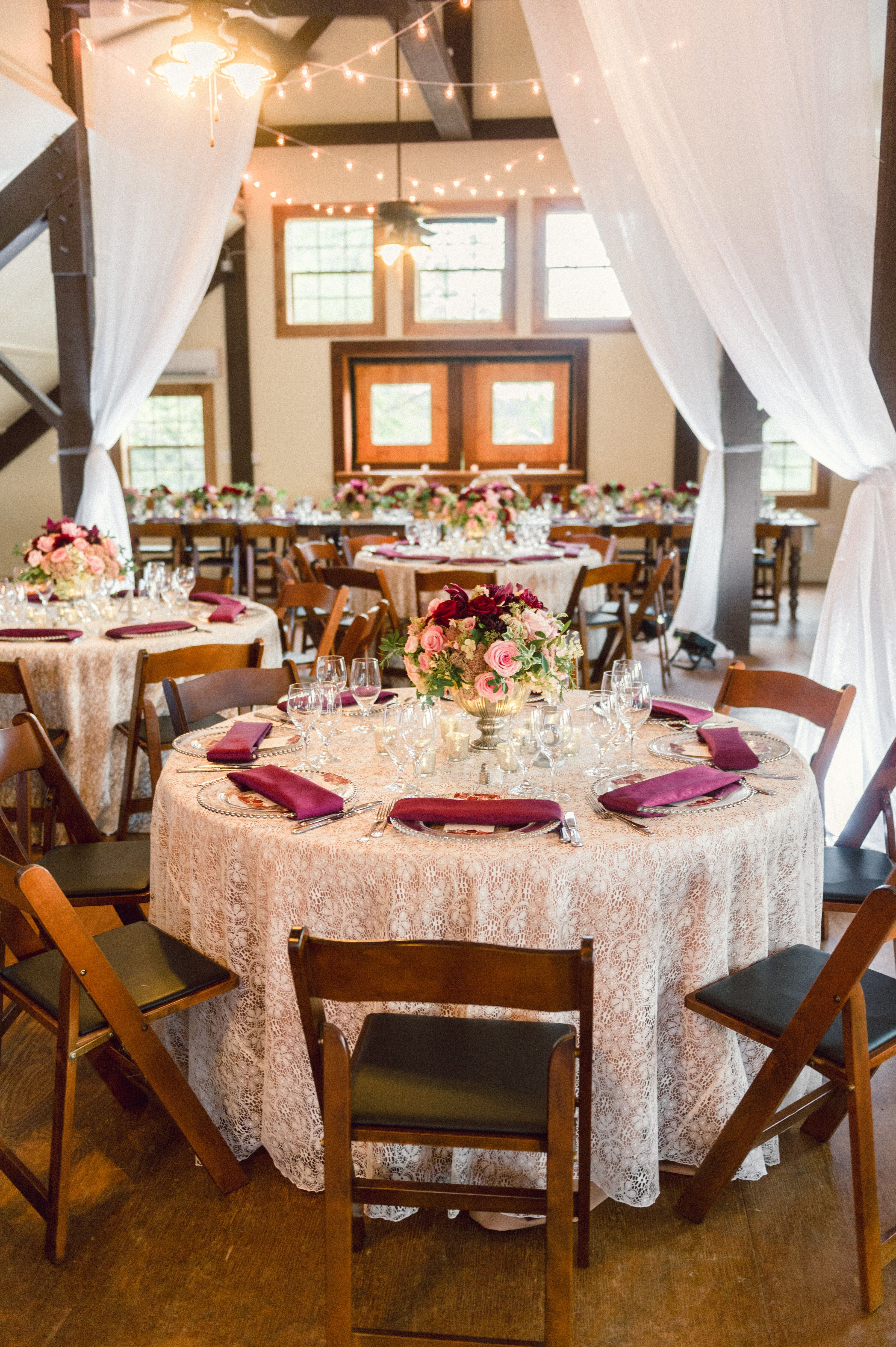 Reception with White Draping String Lights and Lace 