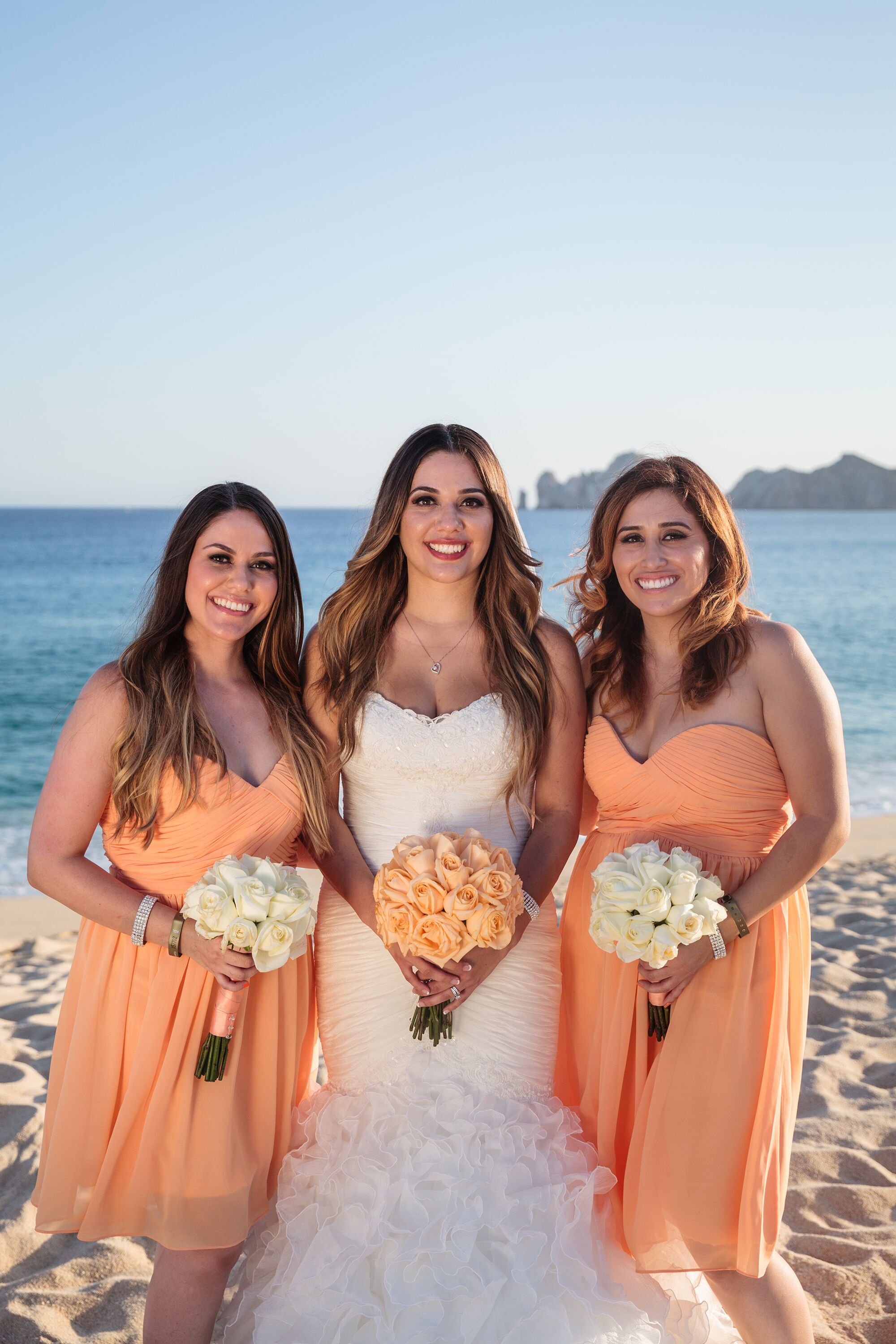 Pastel orange 2025 bridesmaid dresses