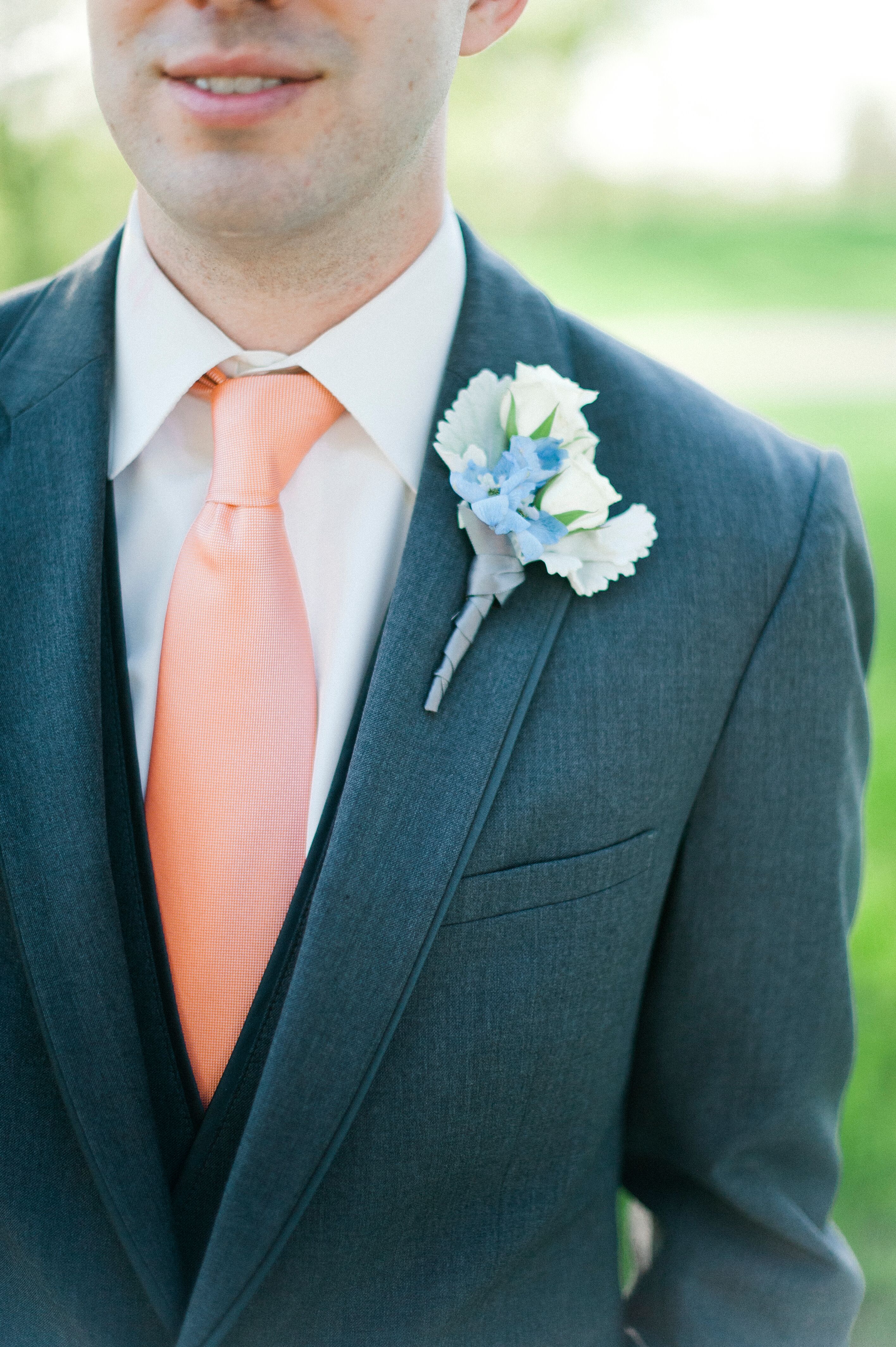 White Rose and Dusty Miller Boutonniere