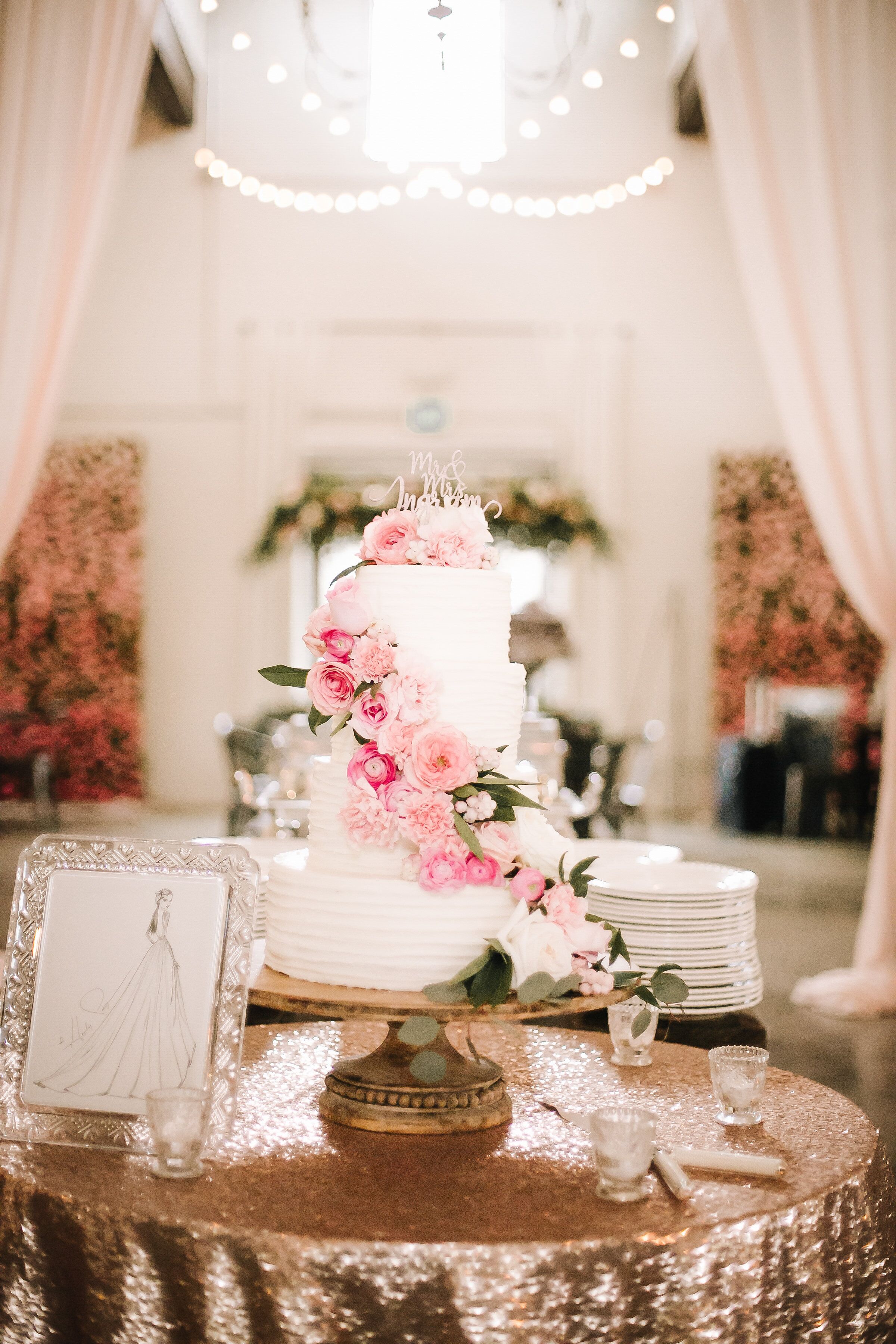 White Wedding Cake with Pink Flowers