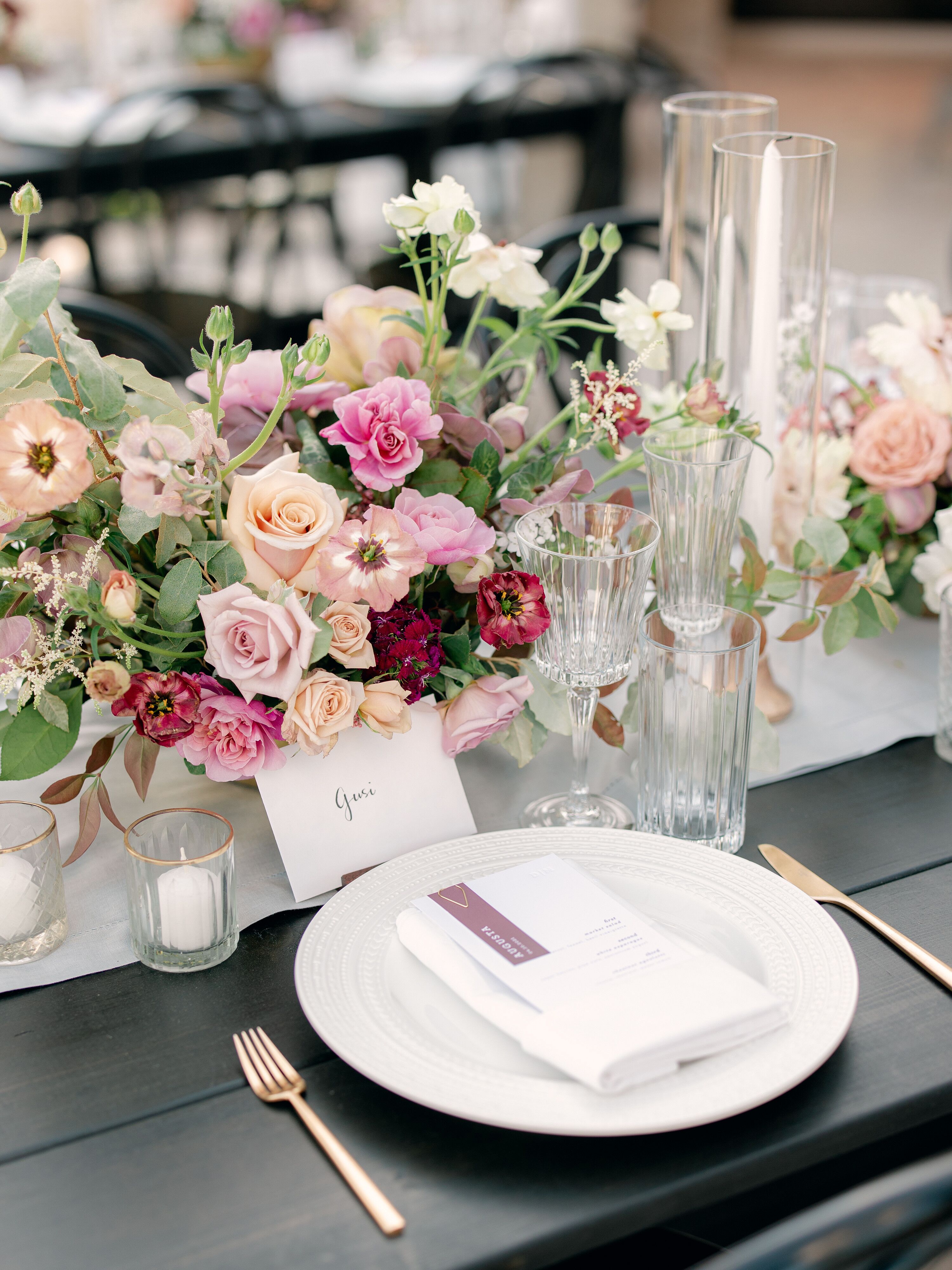 Place Setting With Gold Flatware and Pink Rose Centerpiece