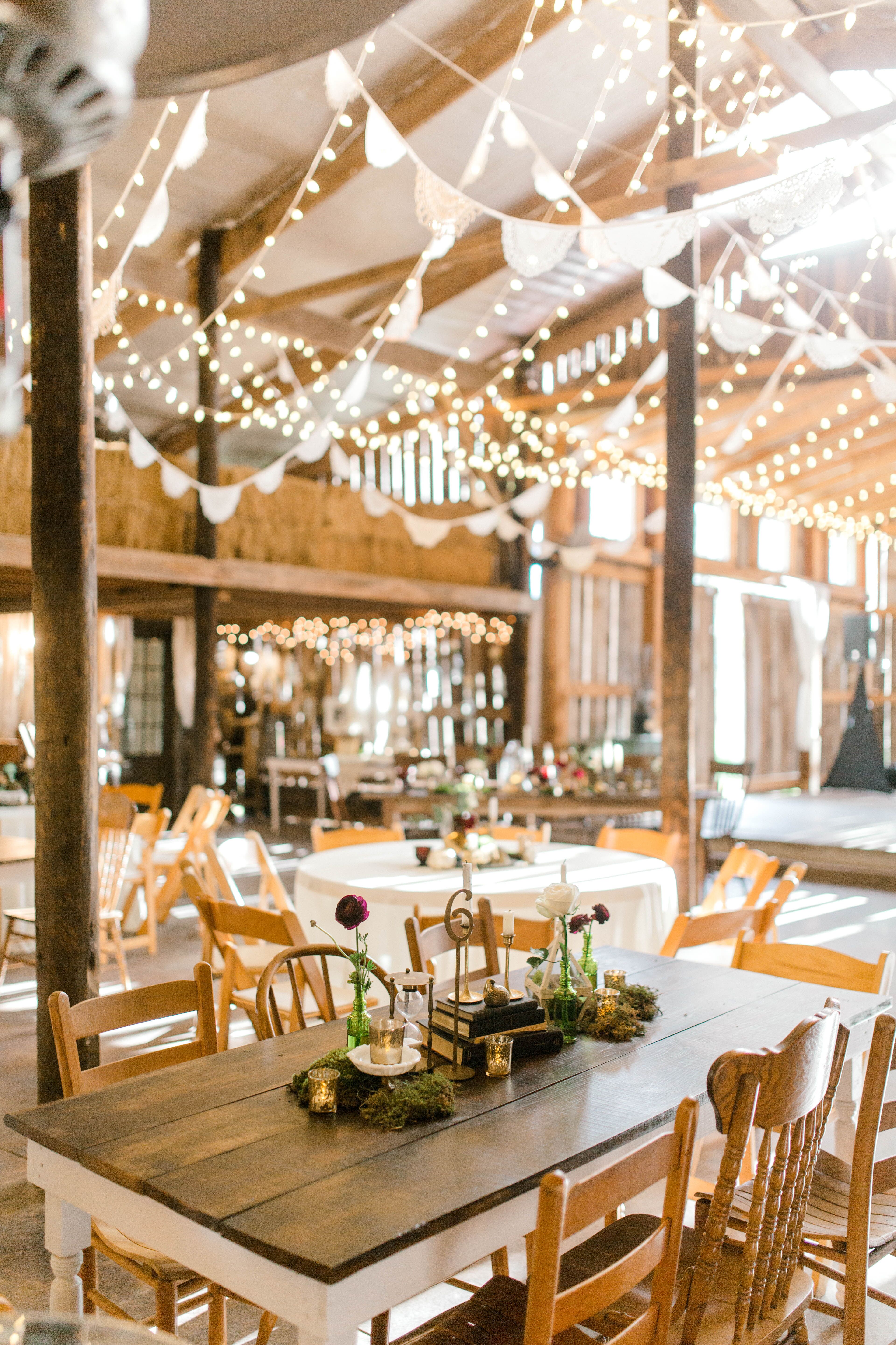 Rustic Reception with Hanging Decorations, String Lights and Mismatched ...