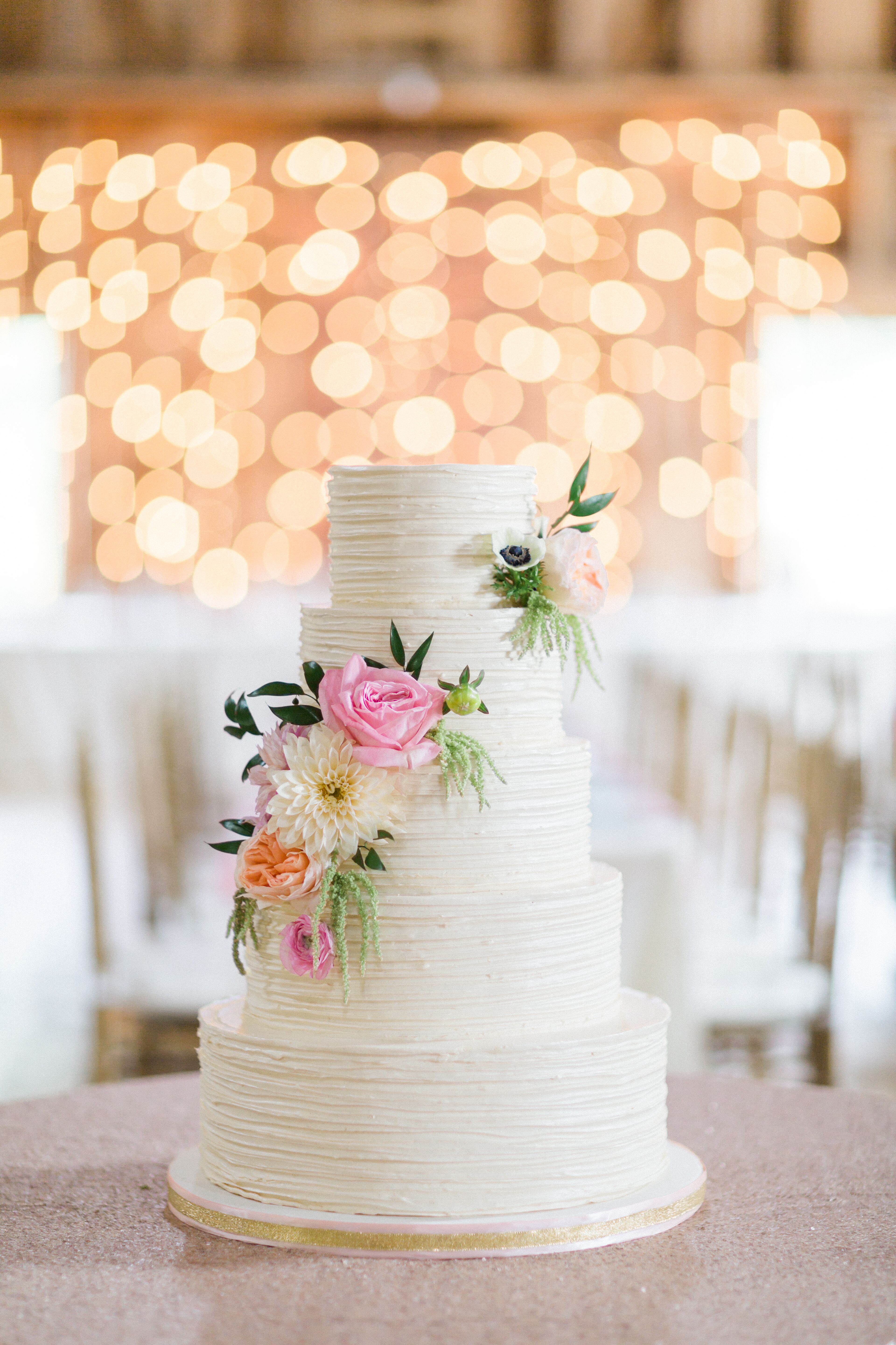 Buttercream Wedding Cake With Fresh Flowers.