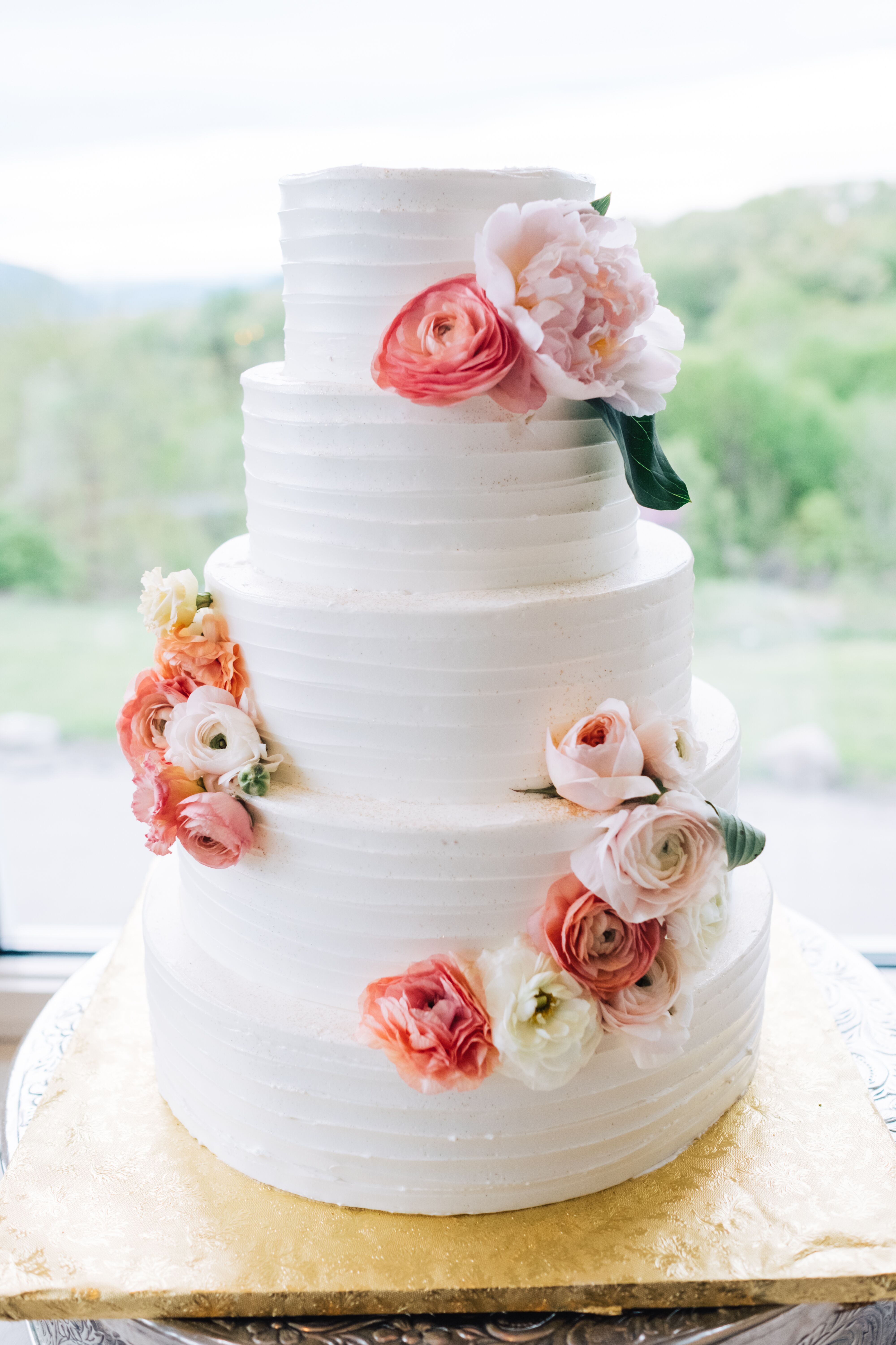 Classic Combed Buttercream Cake with Pink Ranunculuses