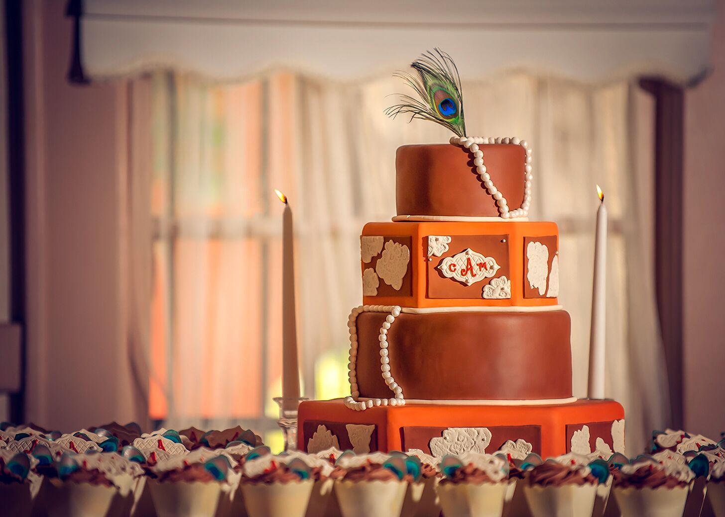 Three Tier Cake And Cupcakes