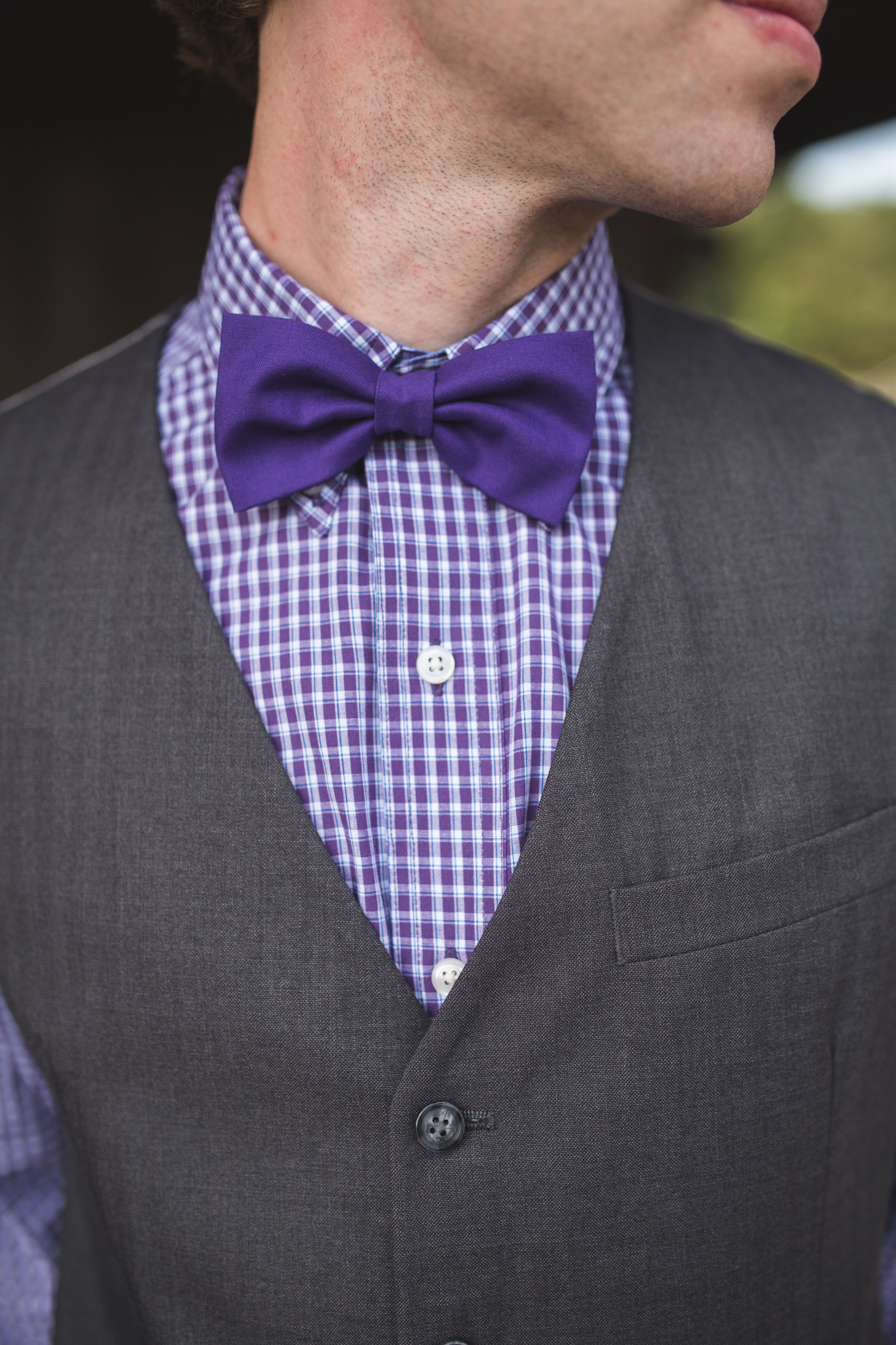 Groom in a Purple Checked Shirt With a Purple Bow Tie