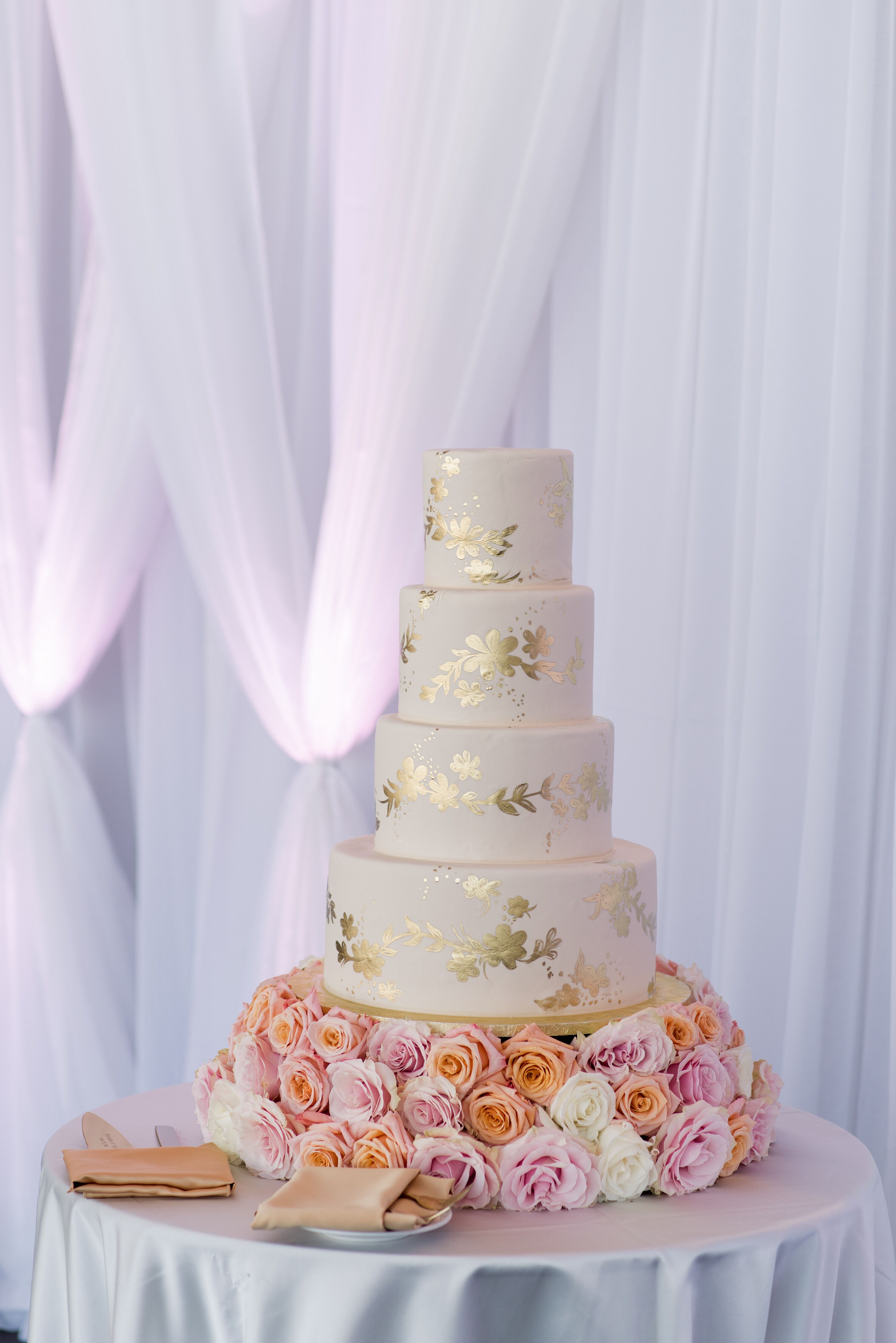 Gold Accented Wedding Cake In Boston 