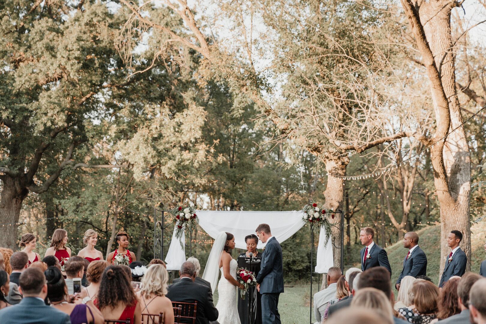 Wedding Ceremony Underneath Linen Arch