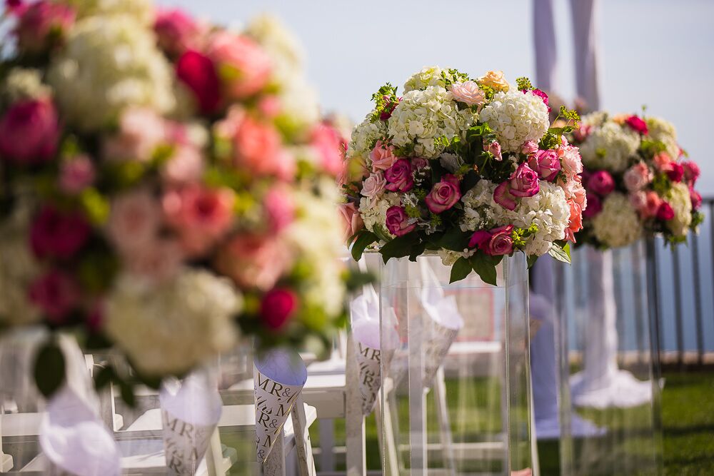 White Hydrangea and Pink Rose Aisle Arrangements