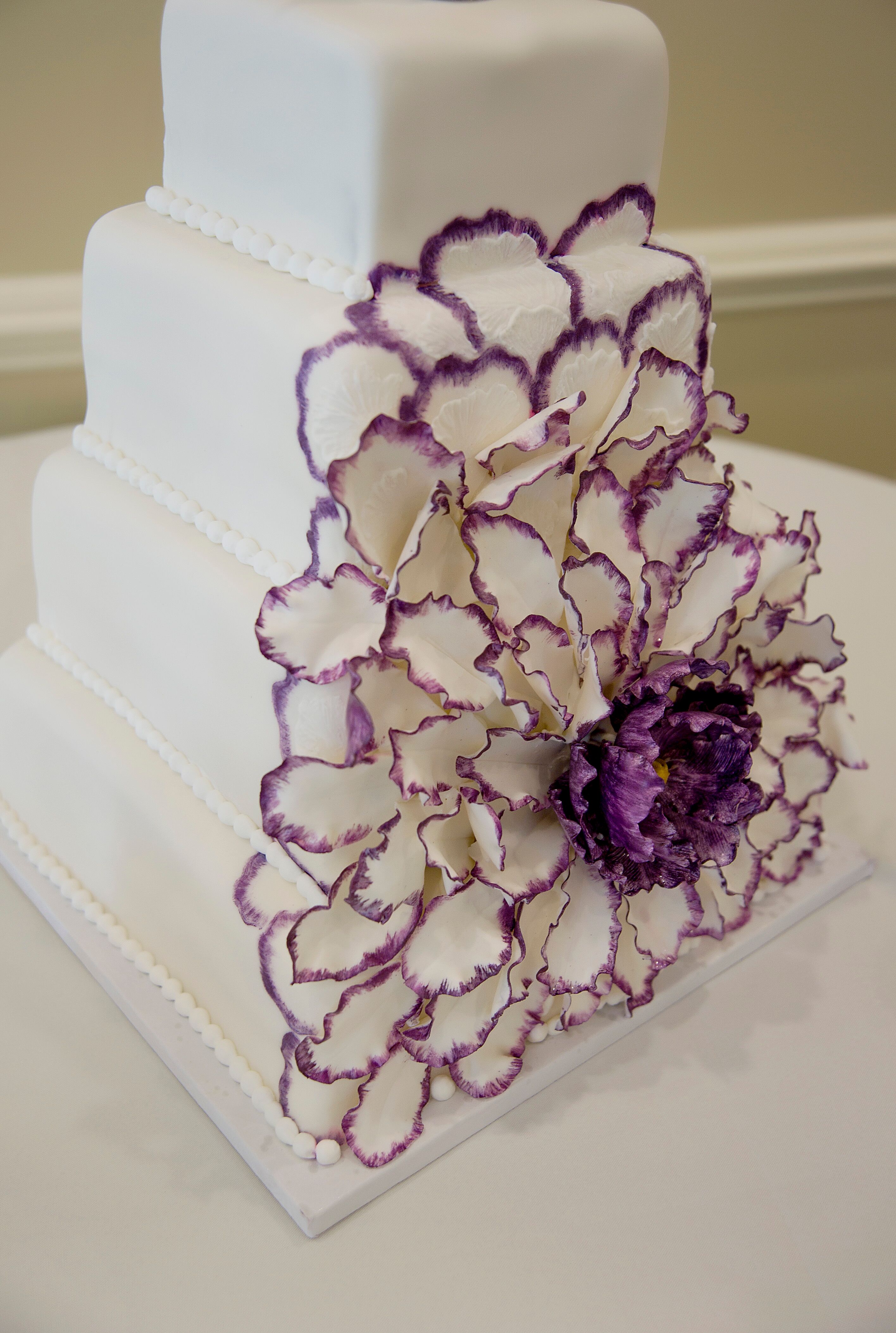 Stunning Purple Cake Flower on White Wedding Cake