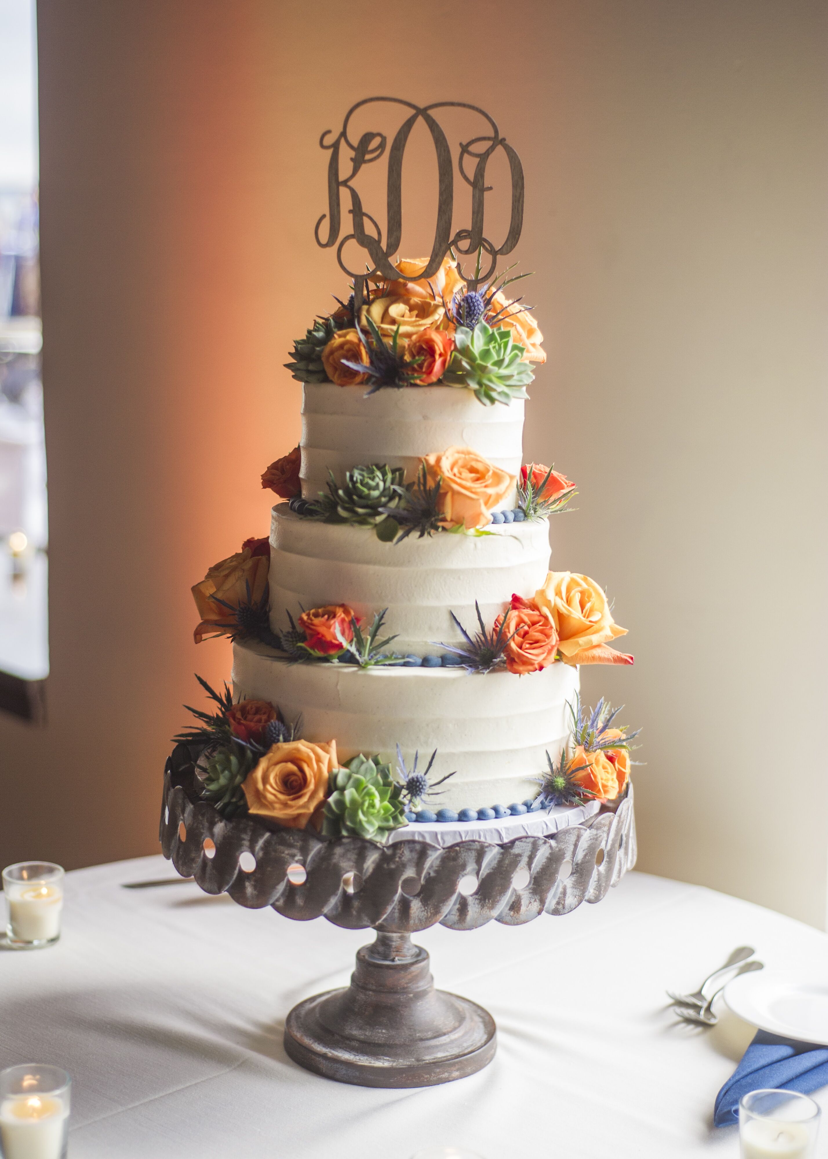 Three-Tier Wedding Cake with Orange Flowers