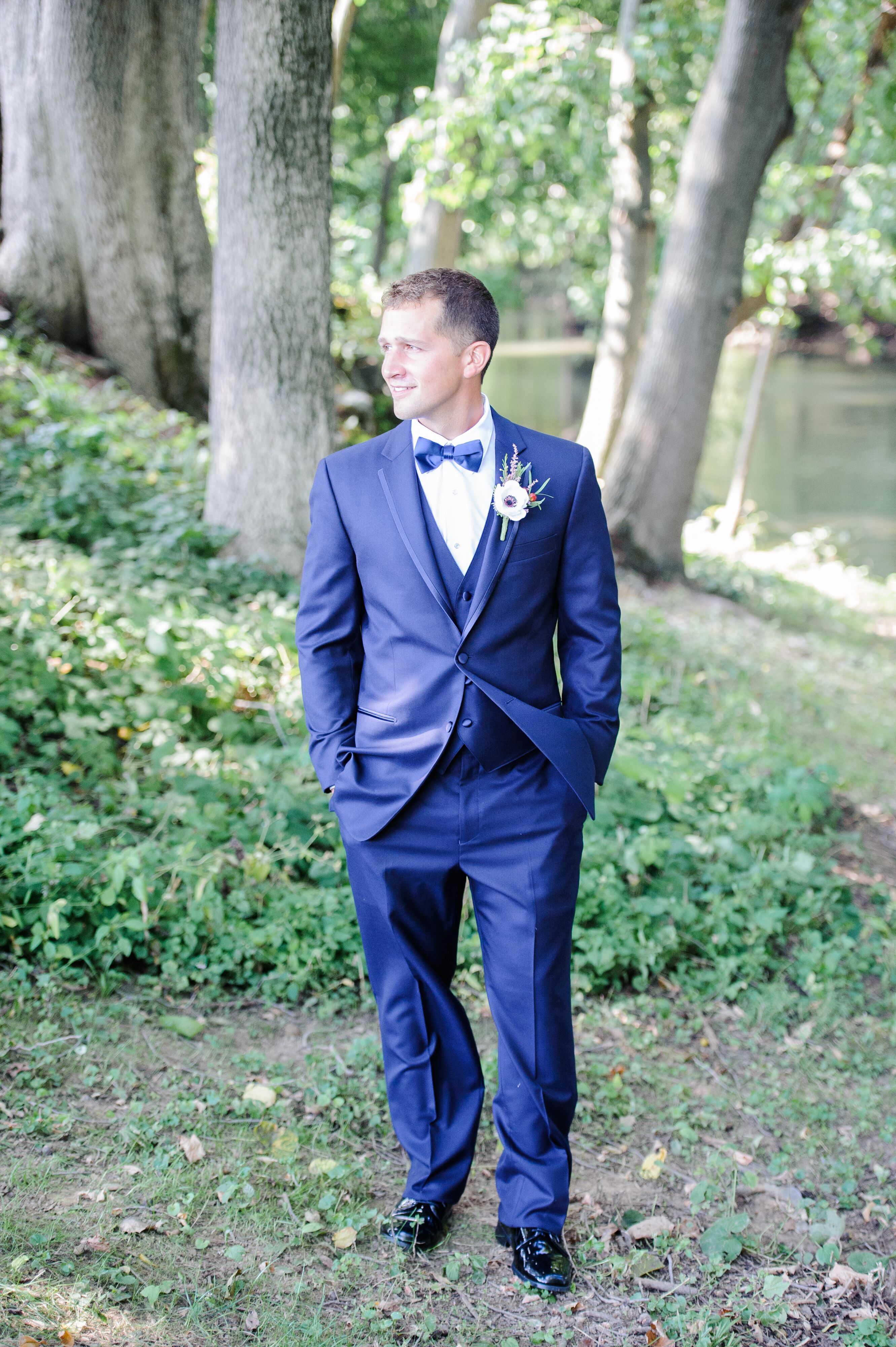 navy blue bow tie suit