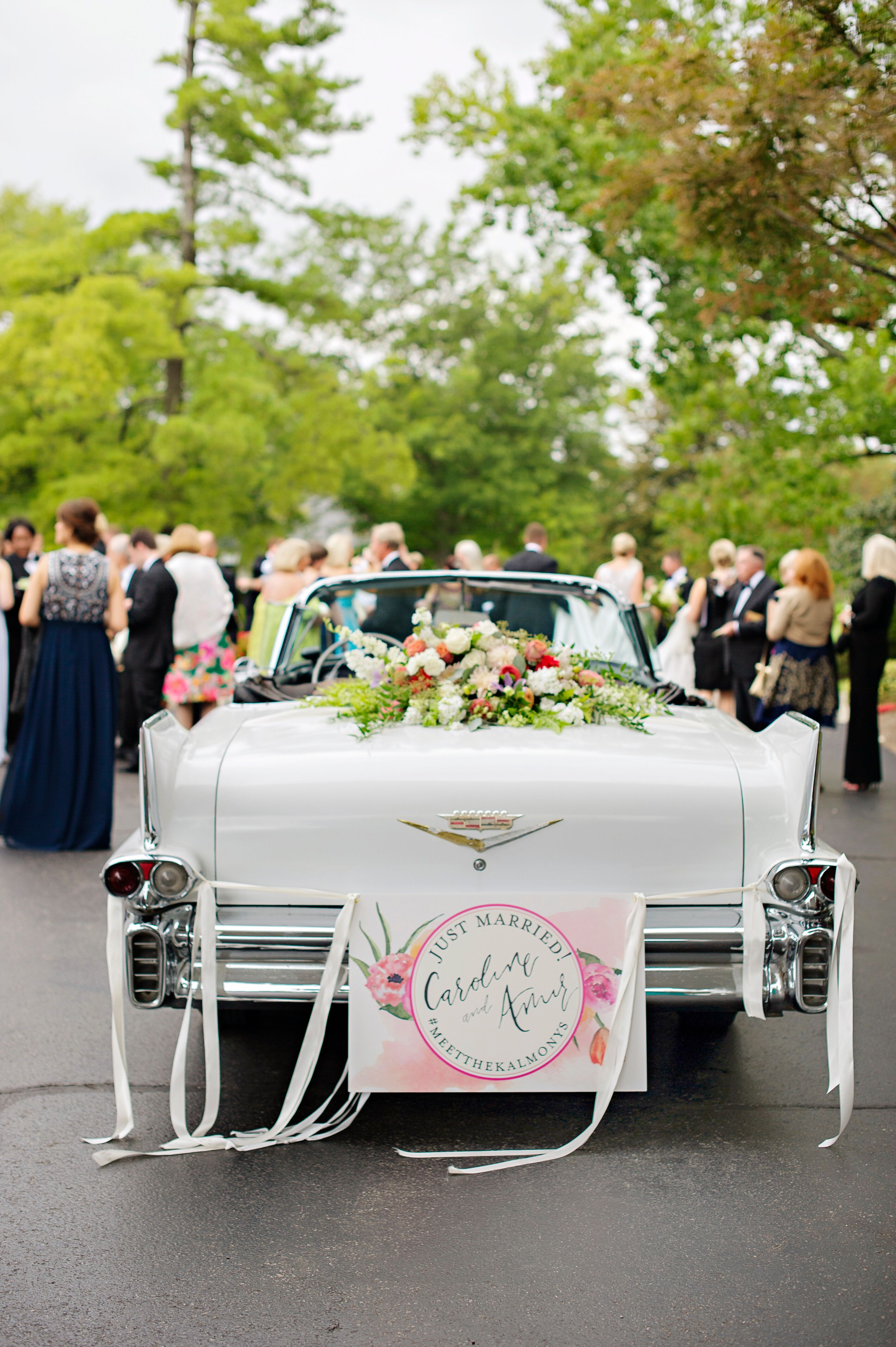 Traditional Exit in Classic White Cadillac