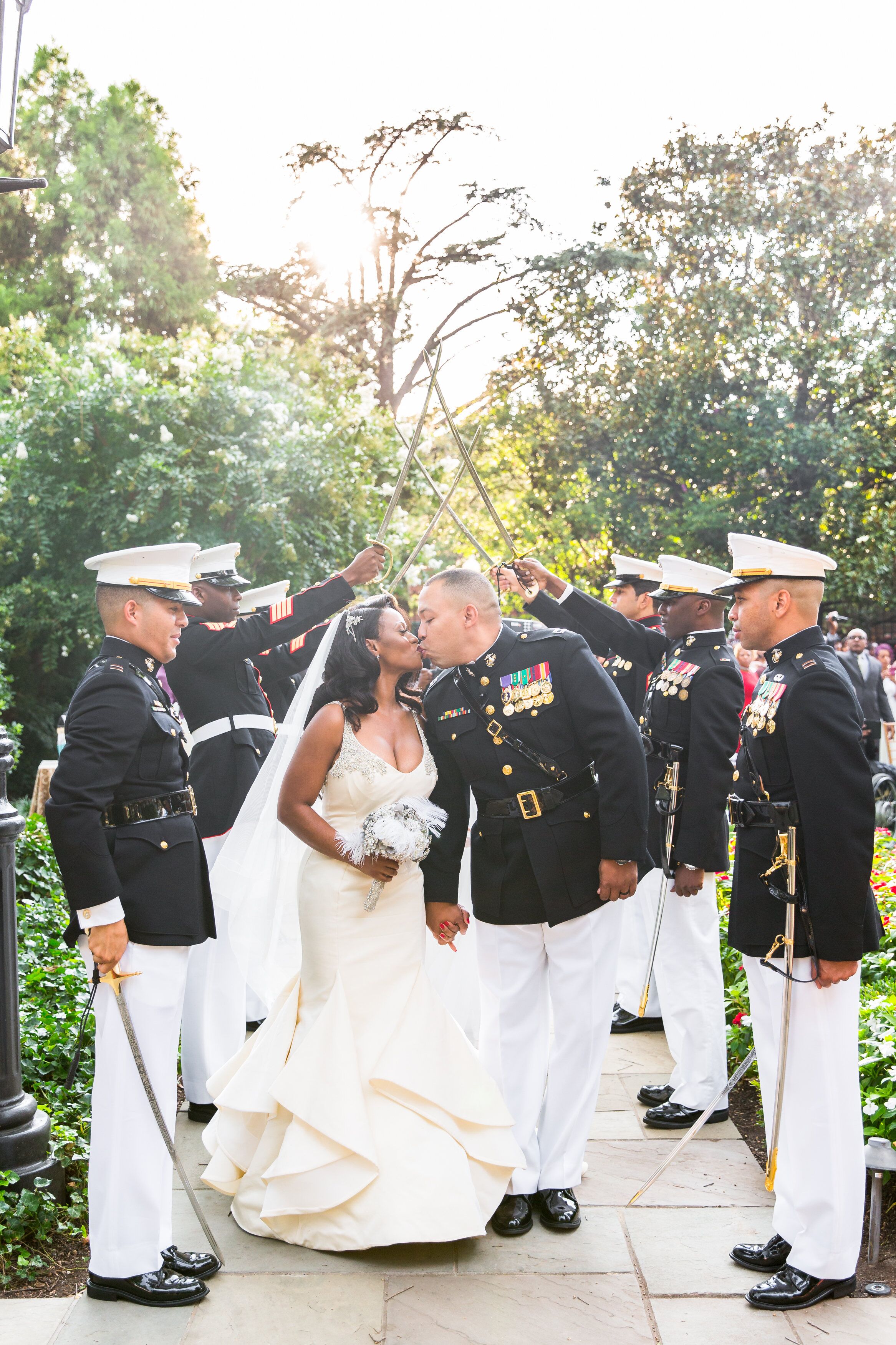 Bride In A Formal Gown And Groom In Military Dress   Ad6b56e7 E837 11e6 B589 12072ec58d1a