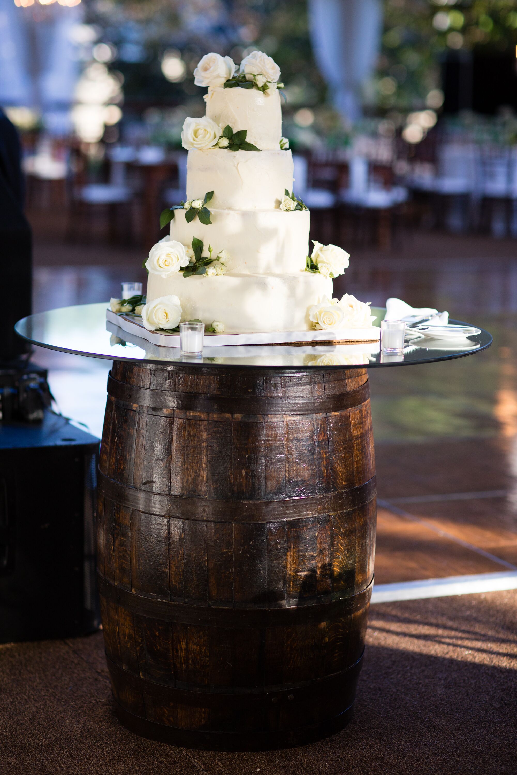 White Rose-Decorated White Buttercream Wedding Cake