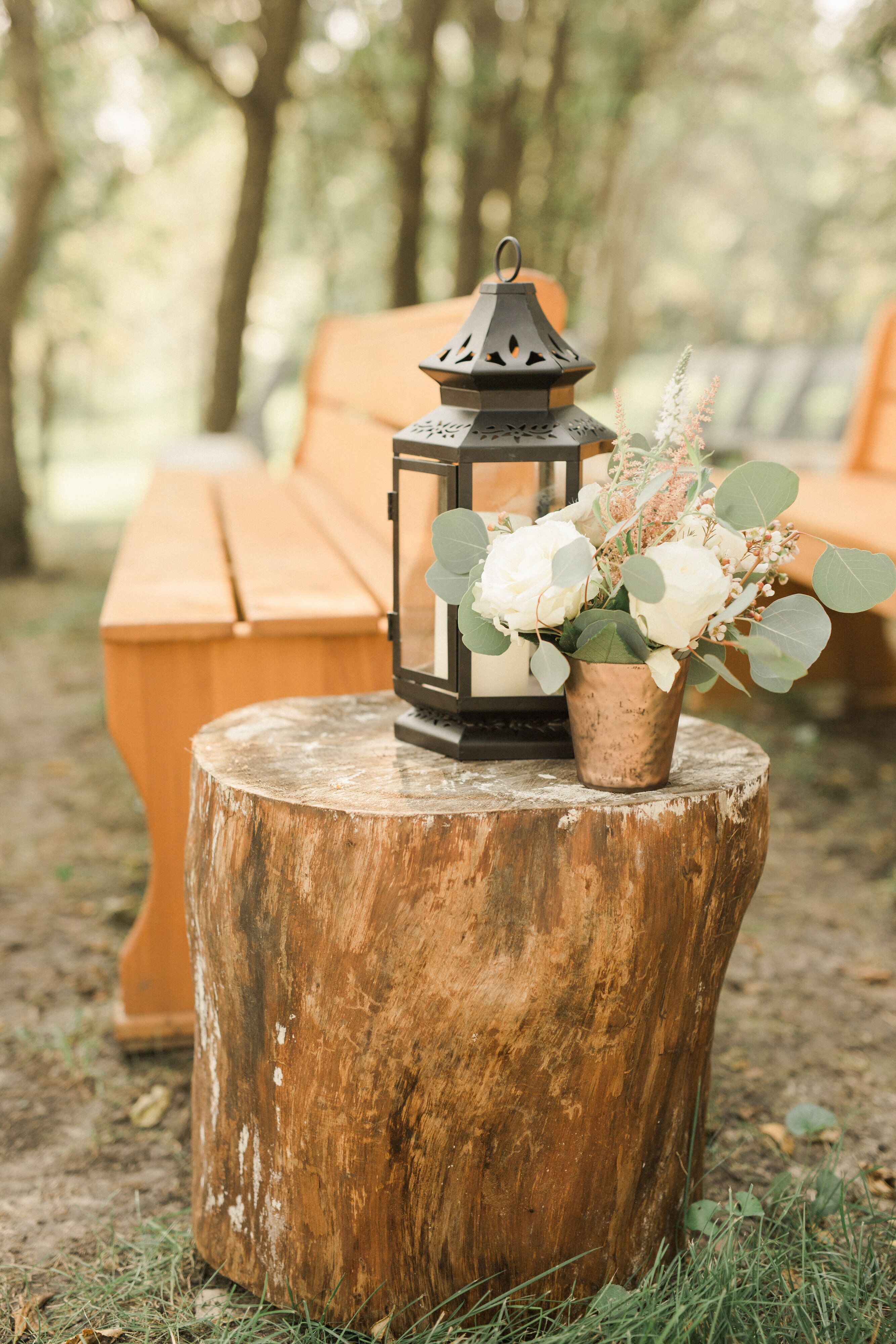 Lantern Decor on Wood Tree Stump