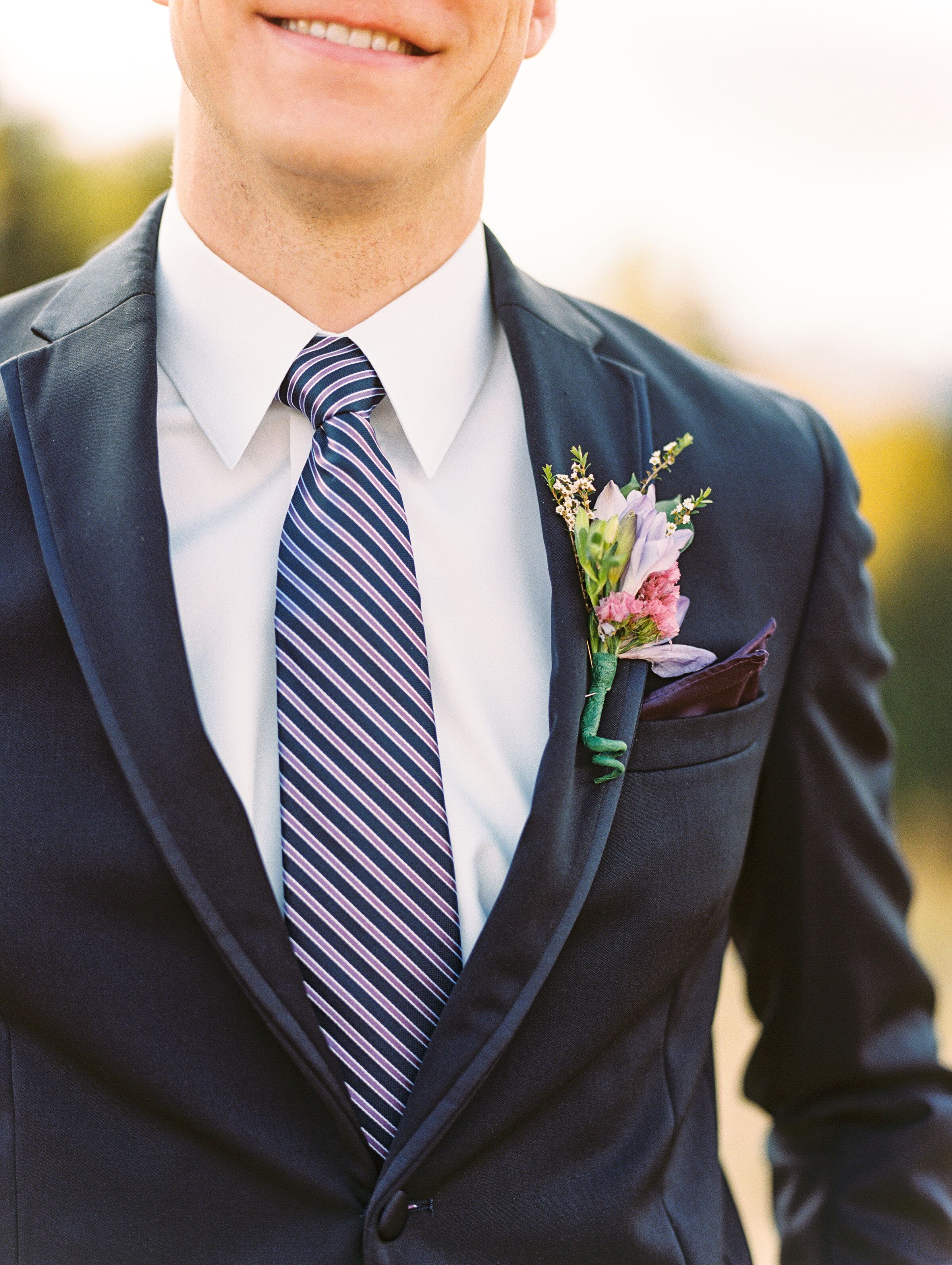 Striped Ties and Navy Groomsmen Suits