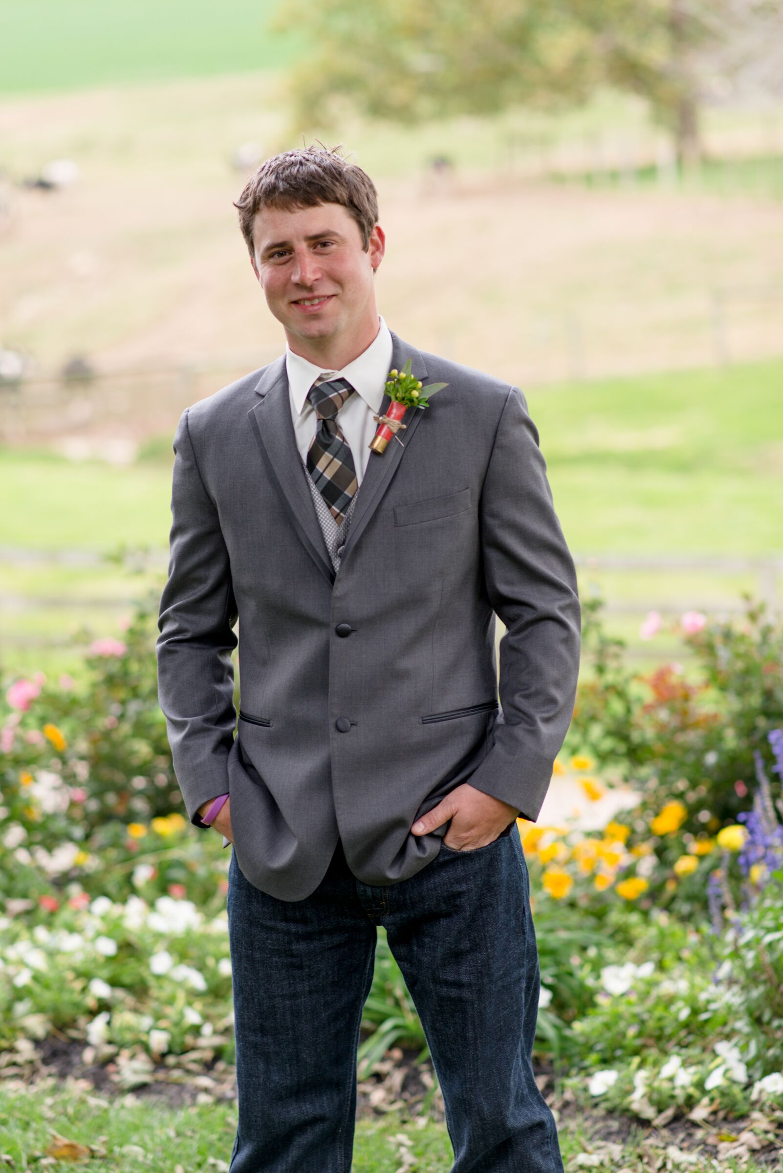 Groom in Jeans and a Gray Blazer