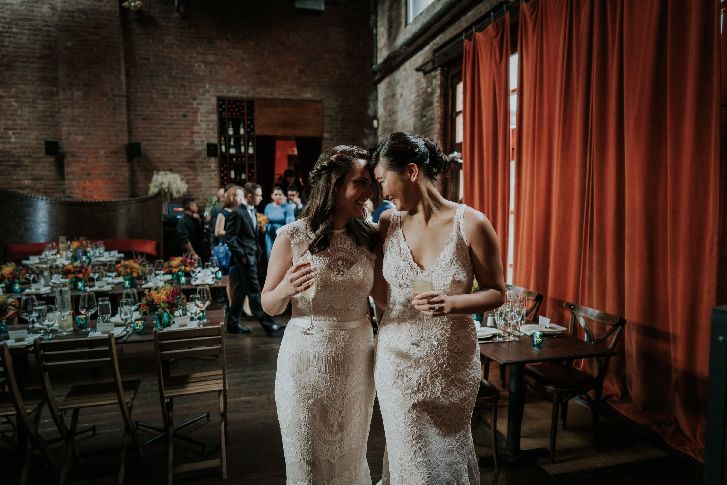Same Sex Brides With Lace Wedding Dresses