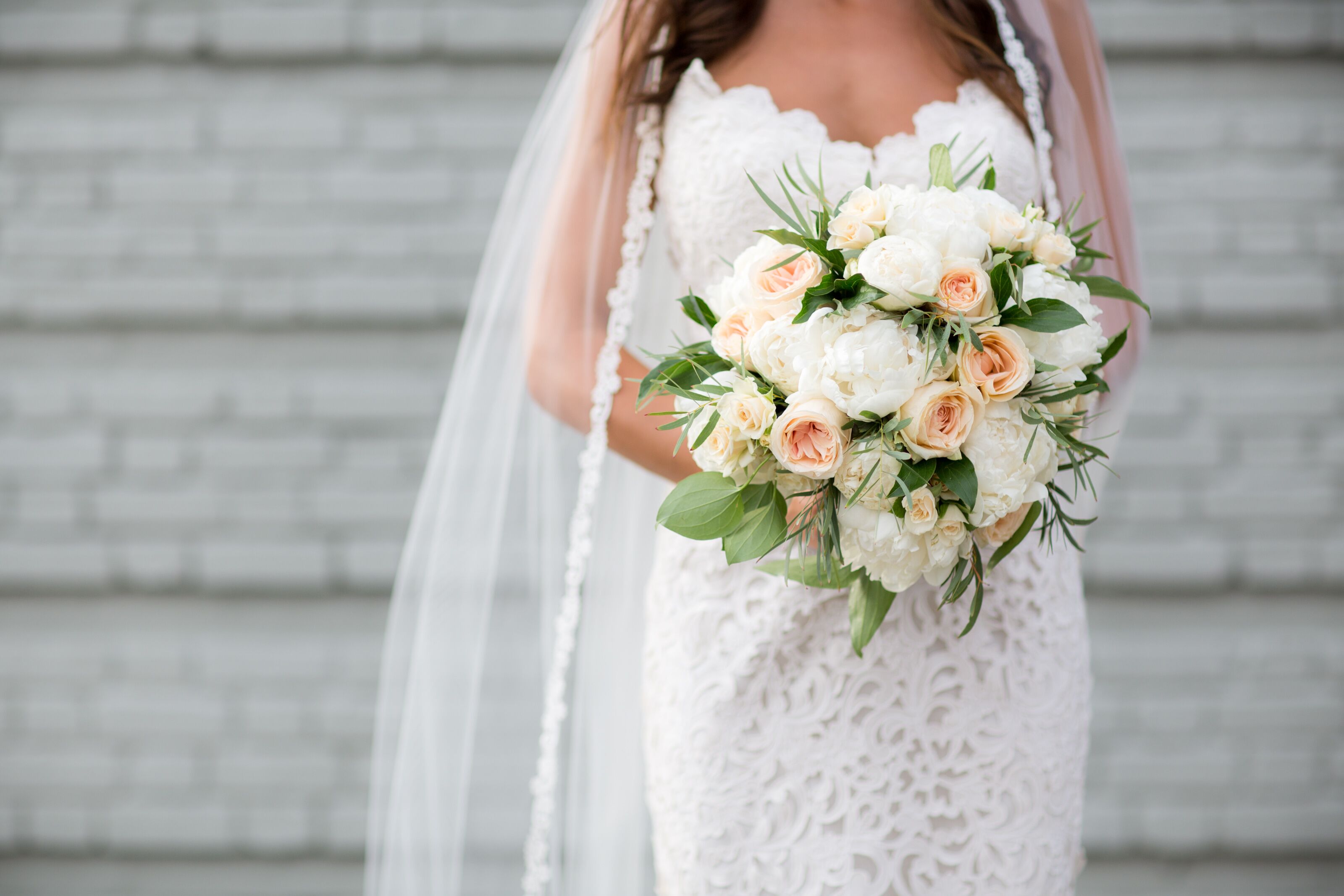 Strapless Elizabeth Fillmore Wedding Dress With Oversized Bouquet 9965