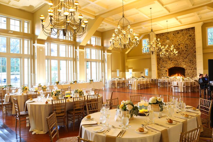 Neutral Ceremony Decor With Amber Uplighting