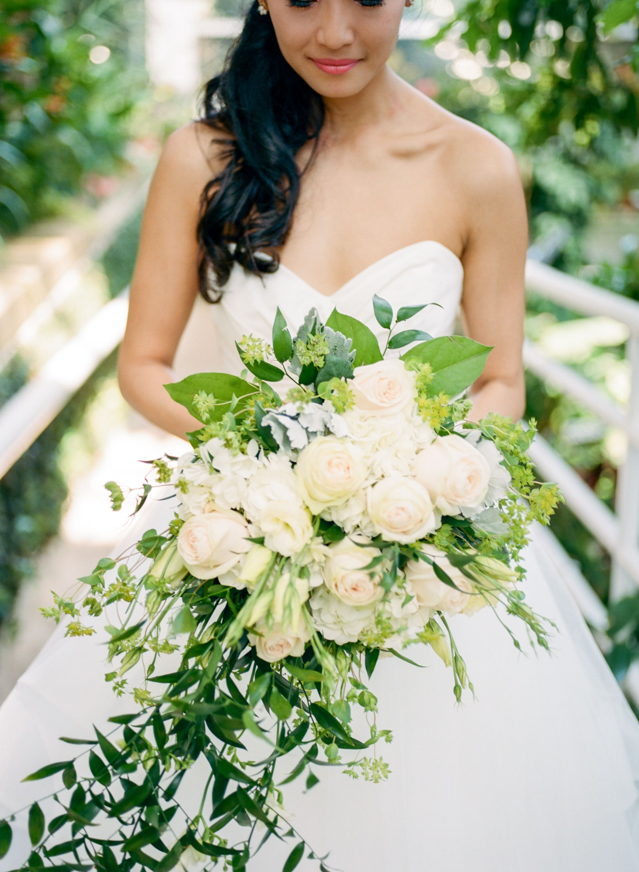 Cascading Bouquet Of Champagne Blooms And Greenery