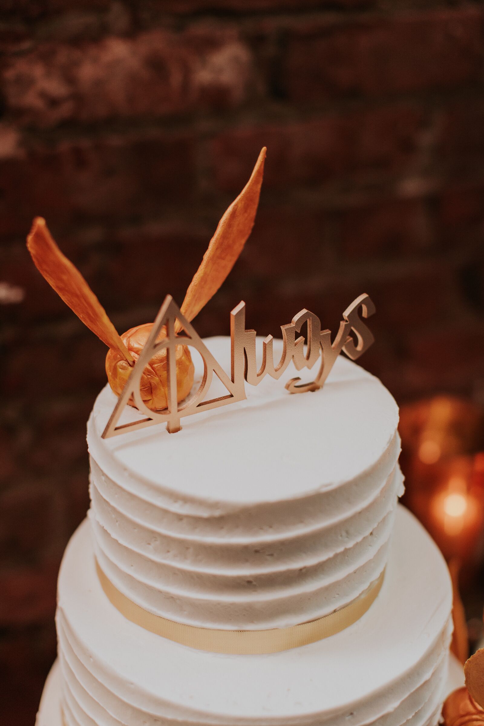 White Frosted Cake with Harry Potter Cake Topper