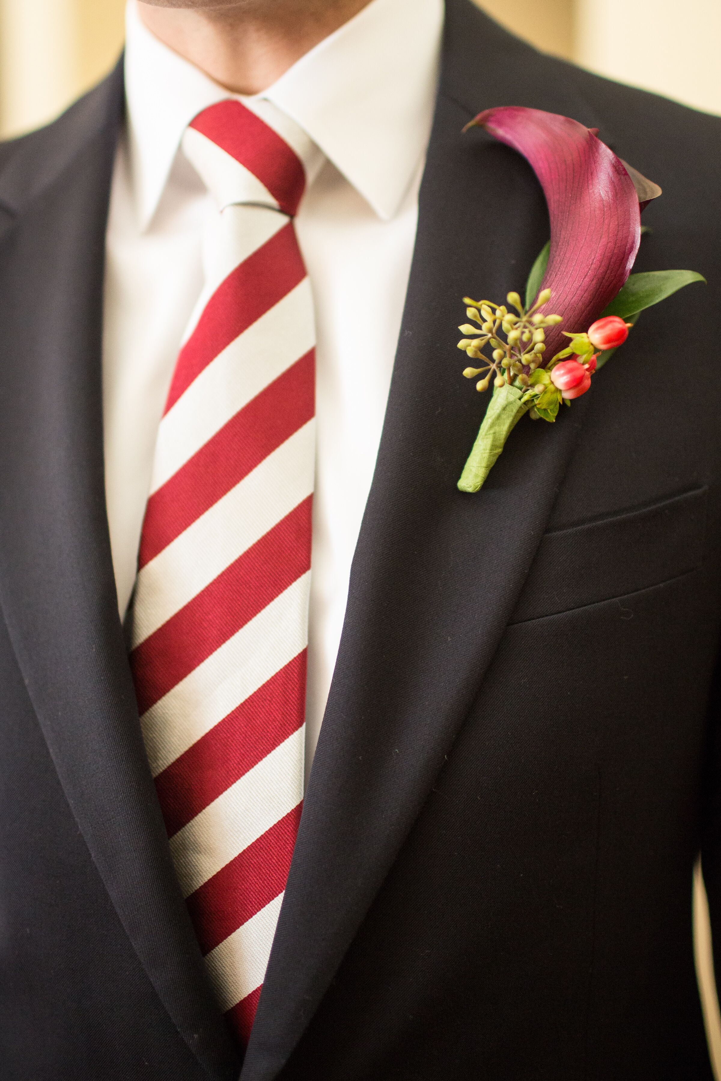 Red Lily, Berry and Eucalyptus Boutonniere