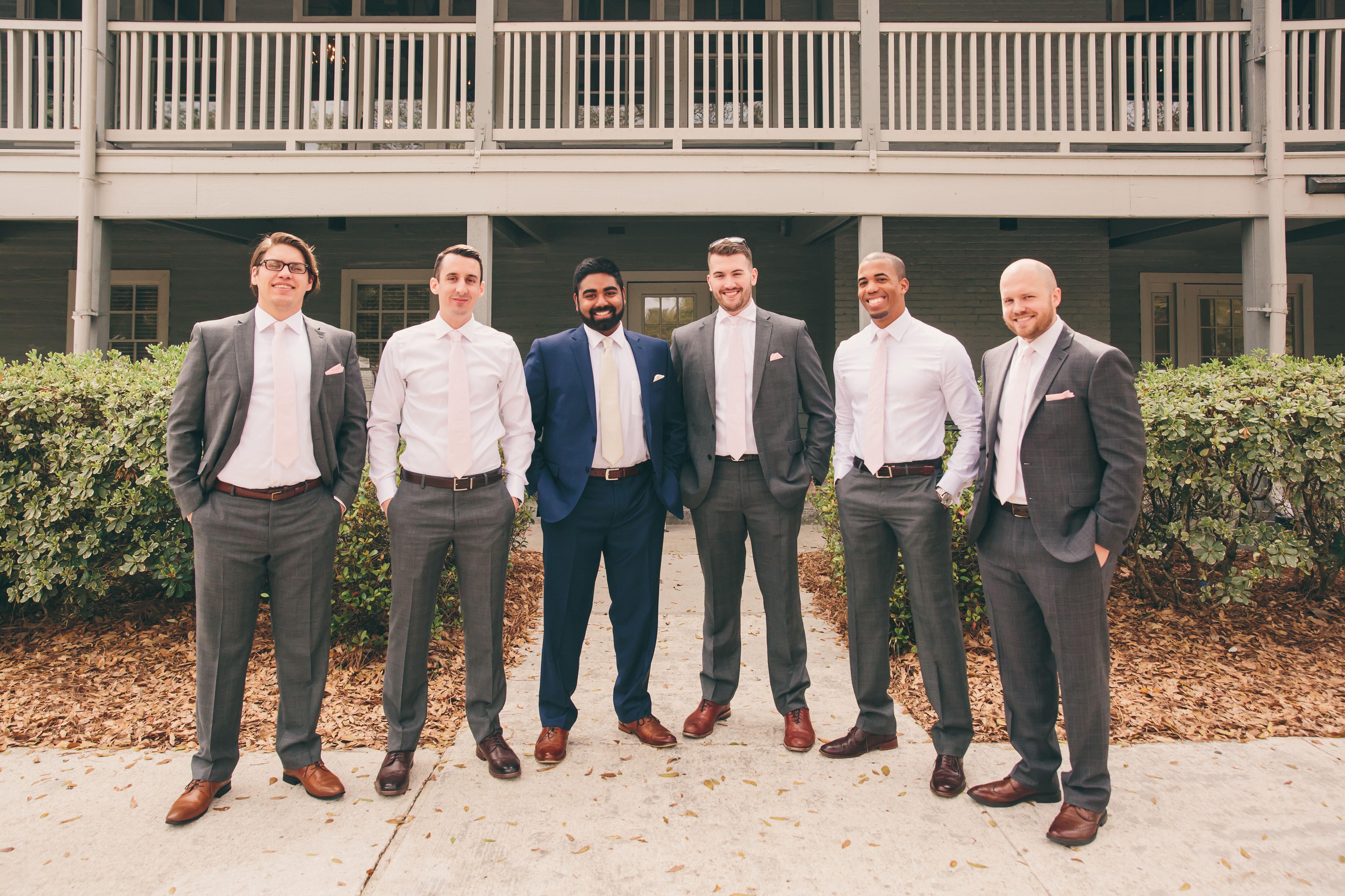 Groom in navy hot sale groomsmen in grey