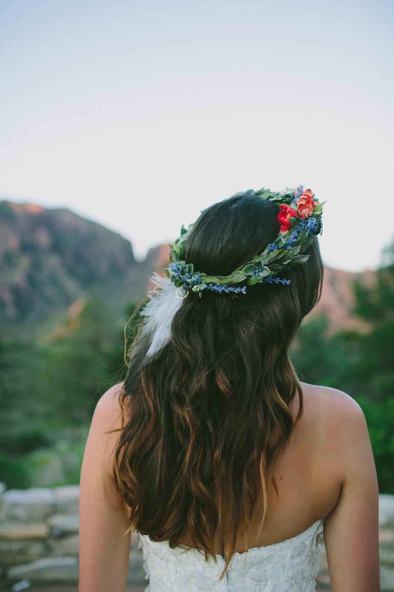 Boho flower crown with a white feather