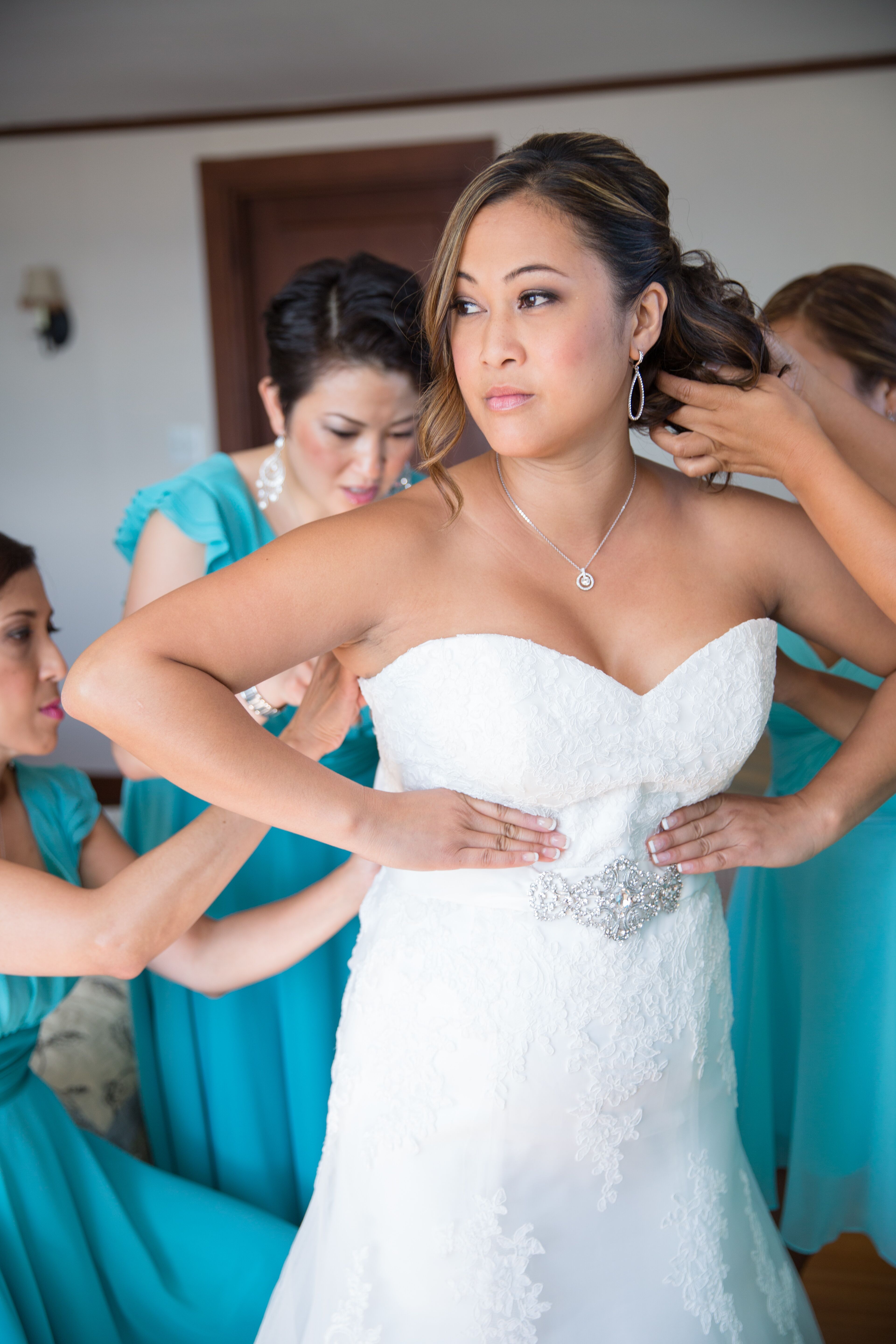 The Bride  Putting  on her Dress