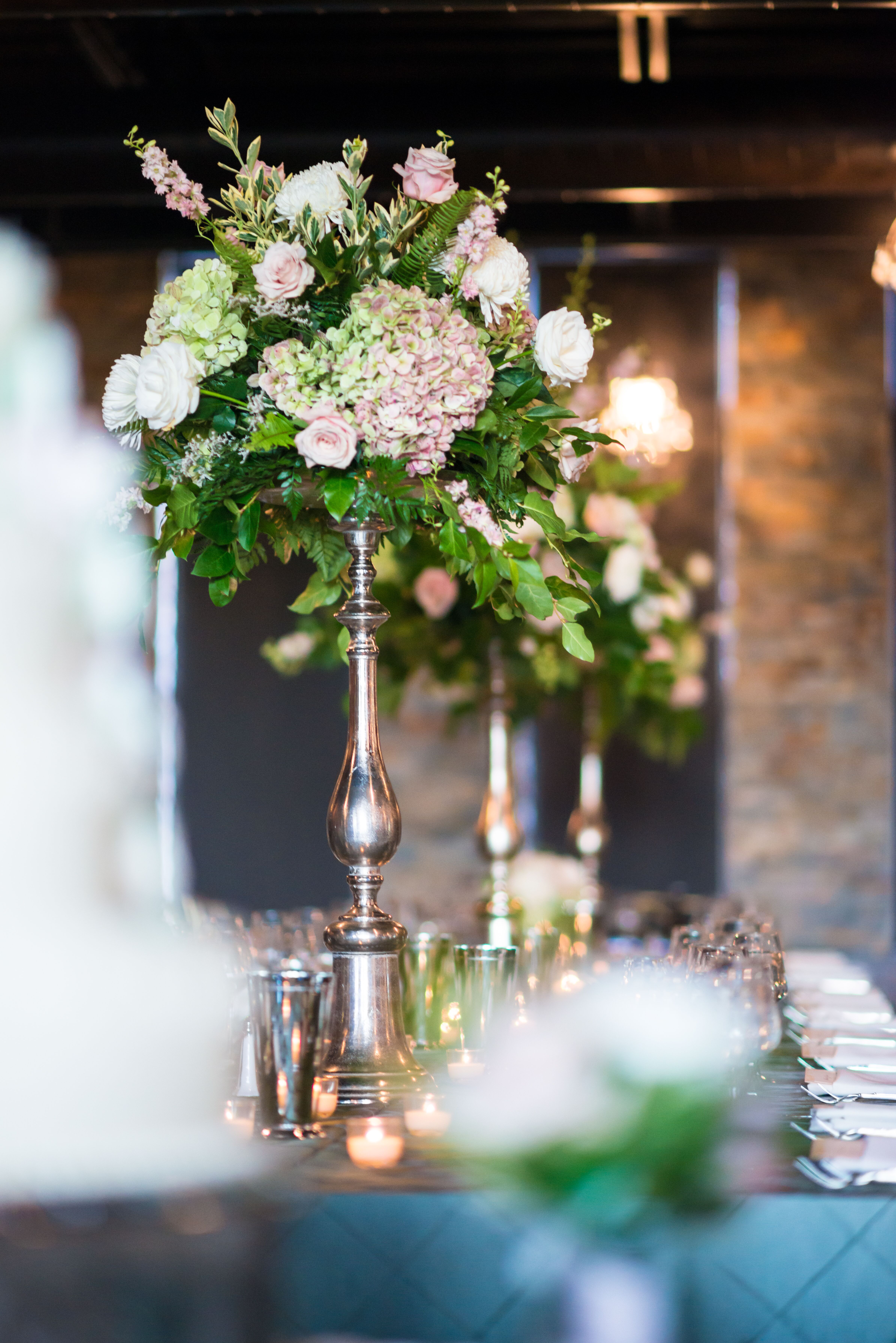 Candelabra Centerpieces With Pink and Ivory Flowers