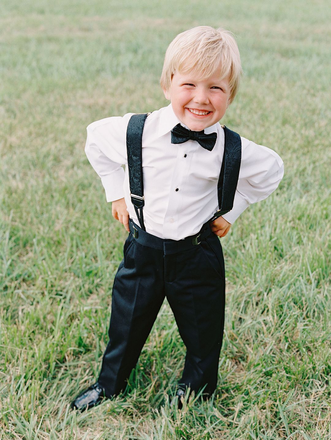 Ring Bearer in Suspenders and Black Bow Tie