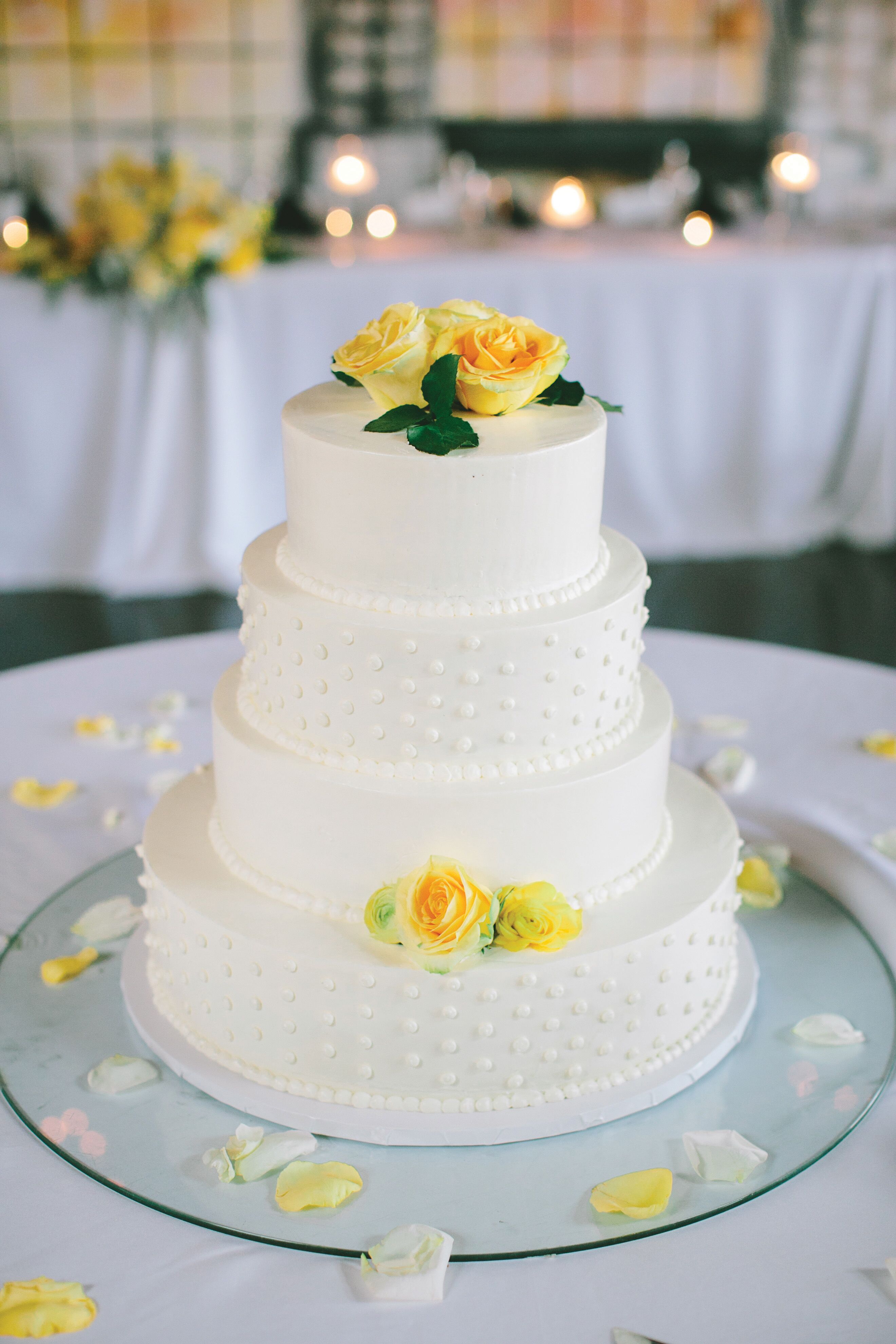 White Buttercream Cake with Yellow Flowers