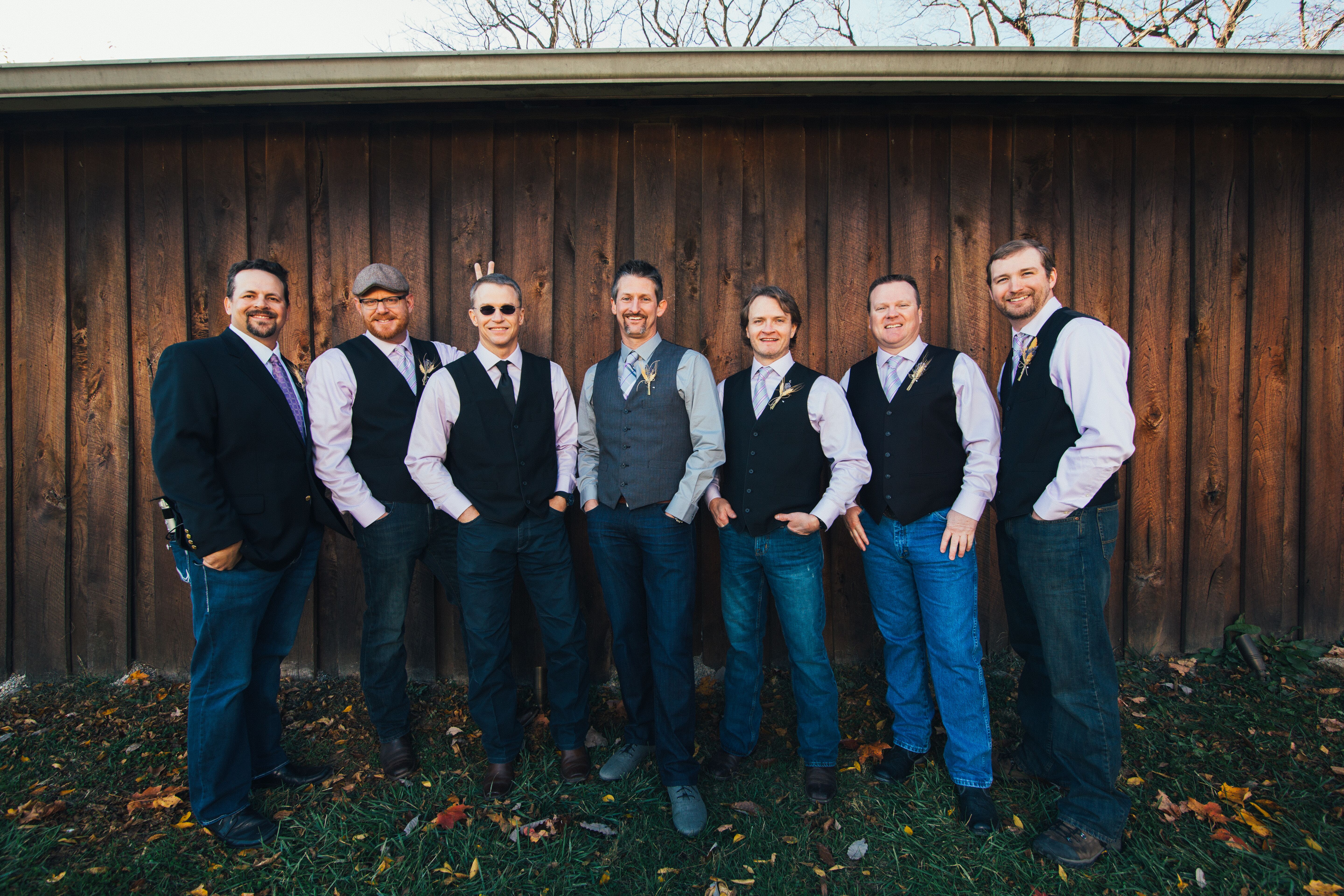 groomsmen vest and jeans