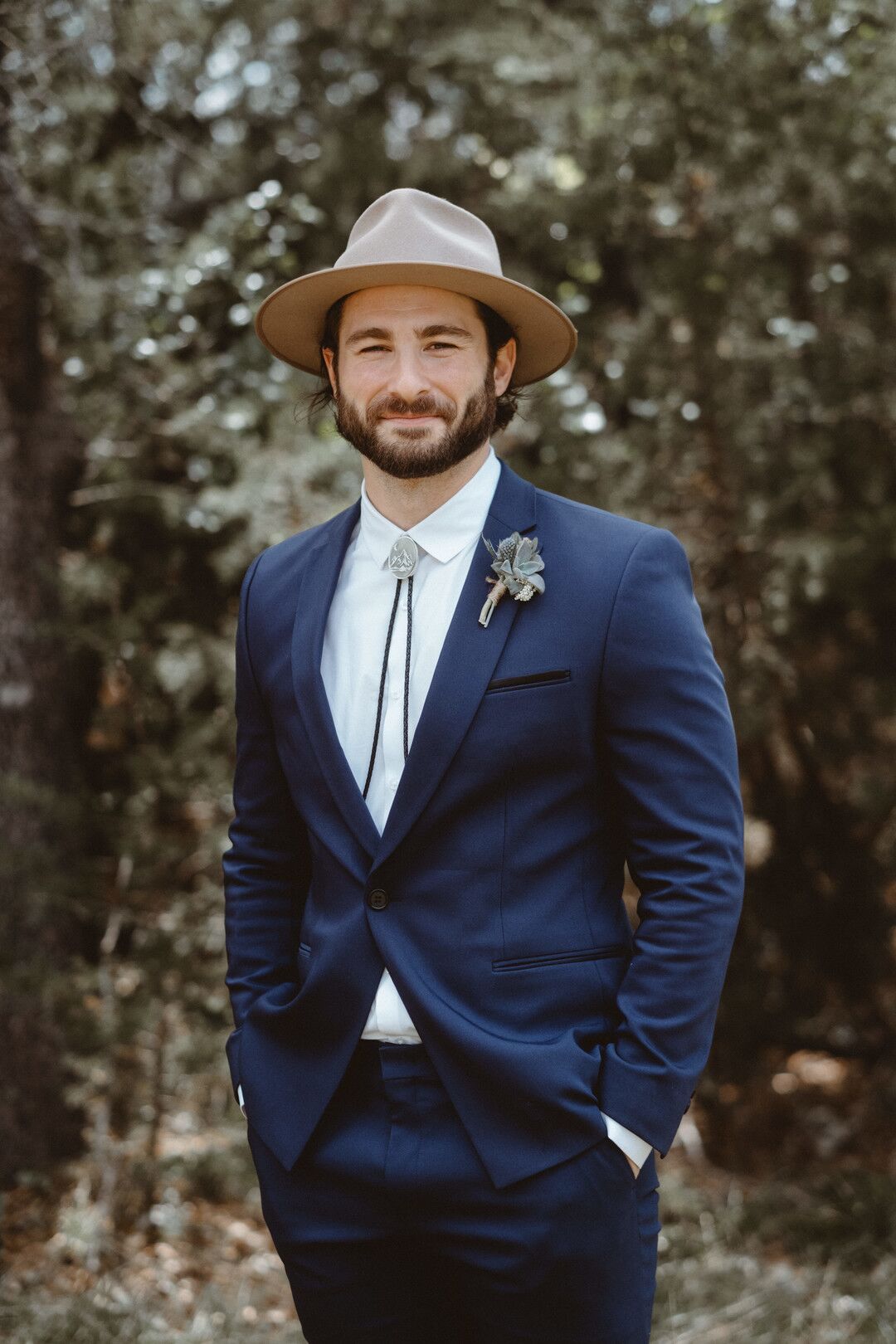 Groom Poses Outside