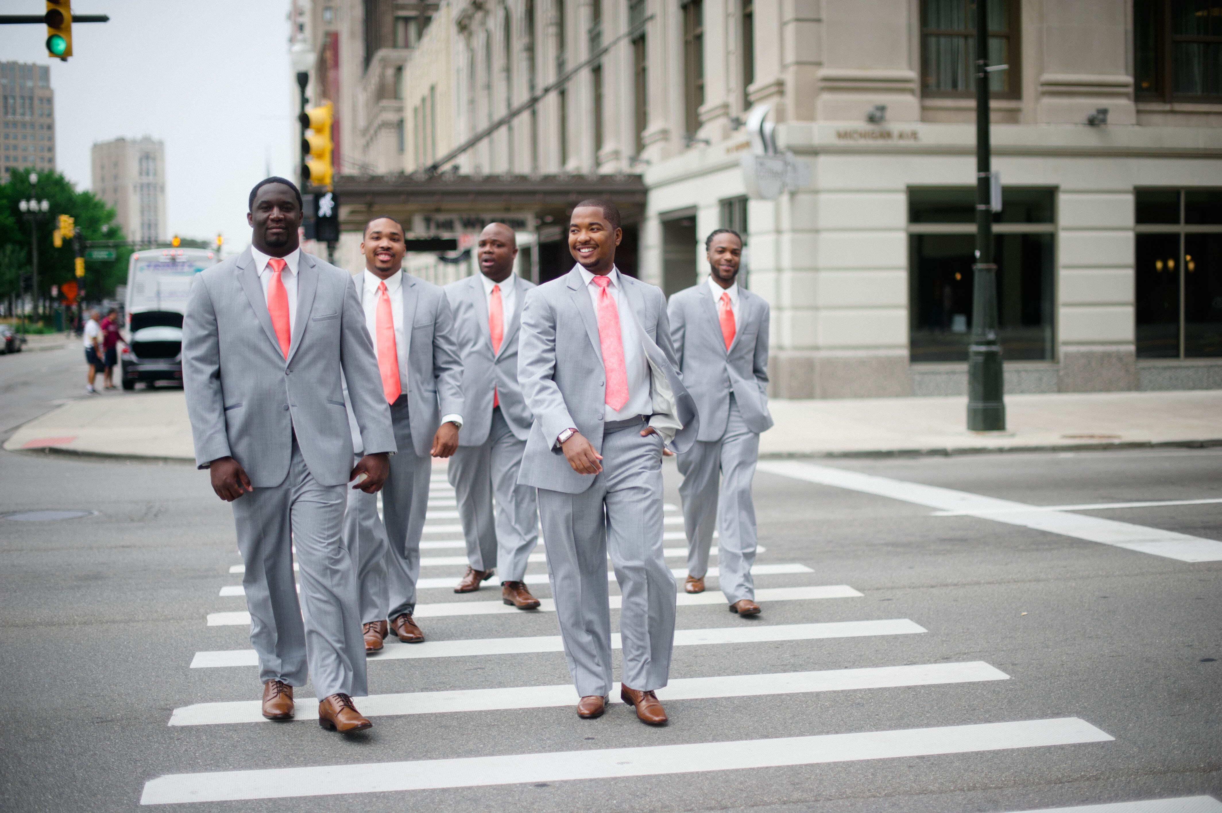 grey and coral suit