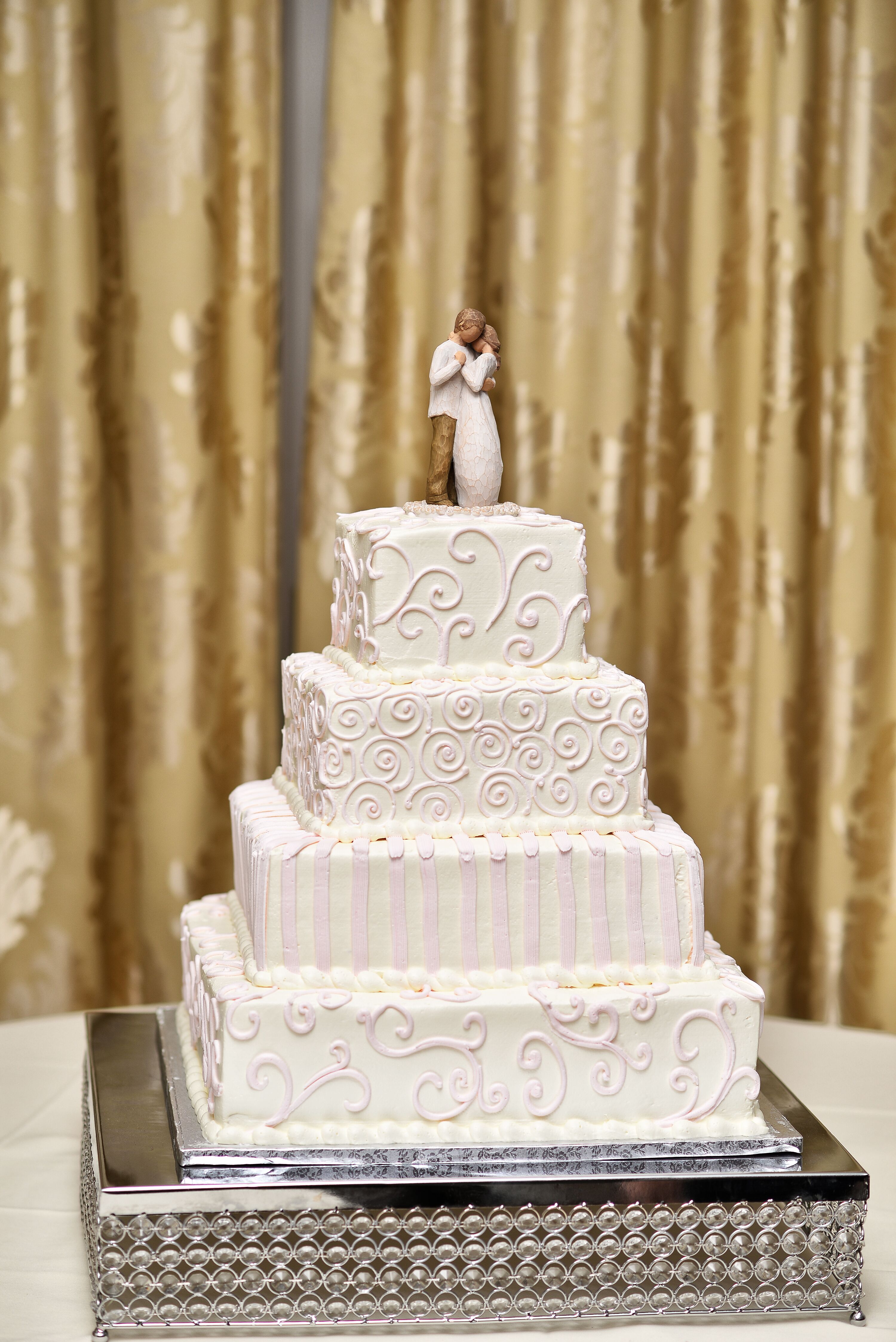 Ivory Buttercream Four-Tier Wedding Cake